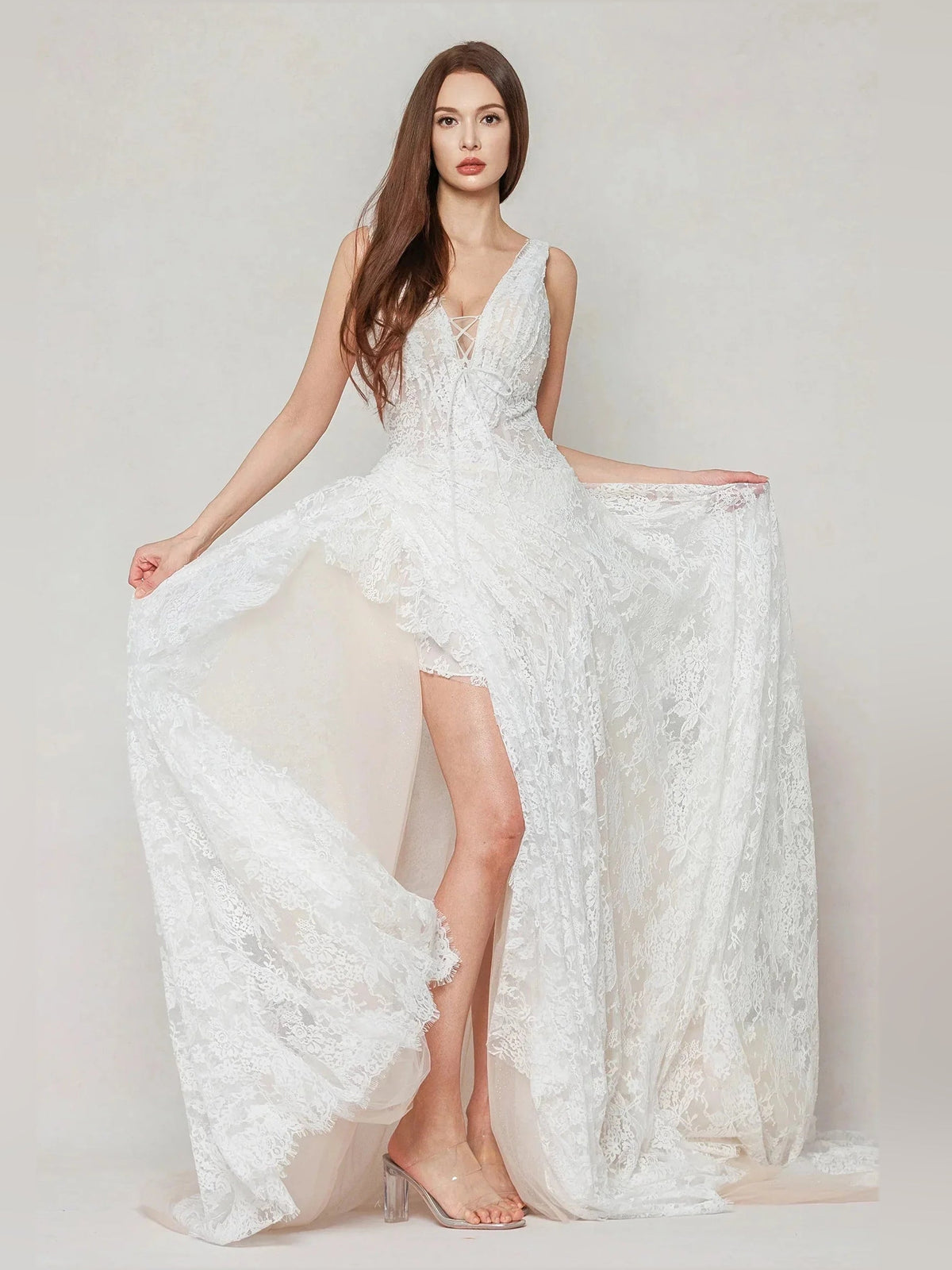 Ivory floral lace wedding dress with V-neck, sleeveless, front slit and long train