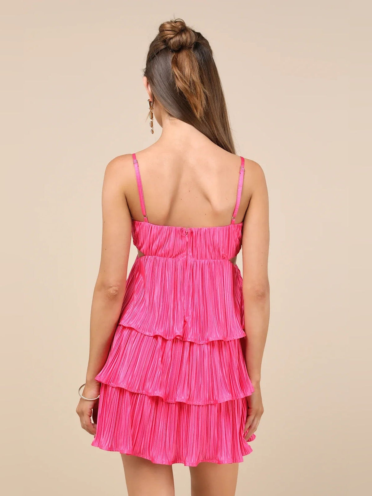 Pink satin mini dress with tiered ruffles and spaghetti straps, back cut-out