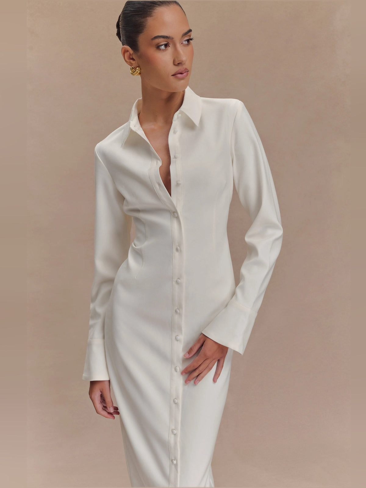 White fitted midi shirt dress front view with pointed collar and long cuffed sleeves