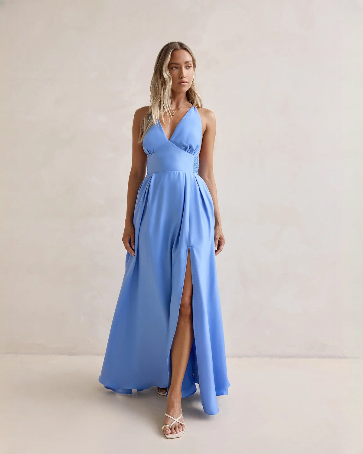 Periwinkle blue chiffon A-line maxi dress with V-neck, thin straps, and long front slit