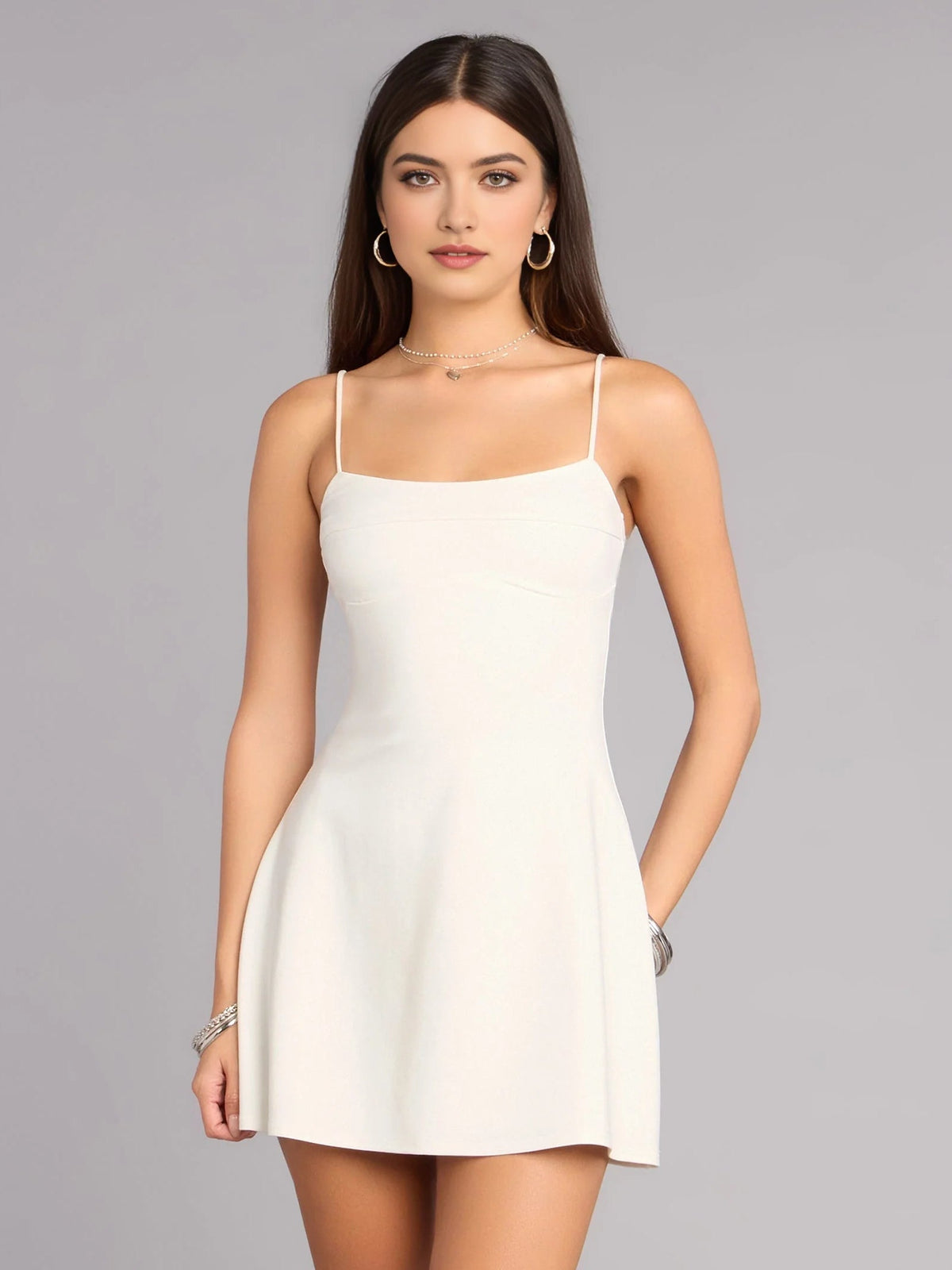 Ivory white mini A-line jersey dress with square neckline and spaghetti straps