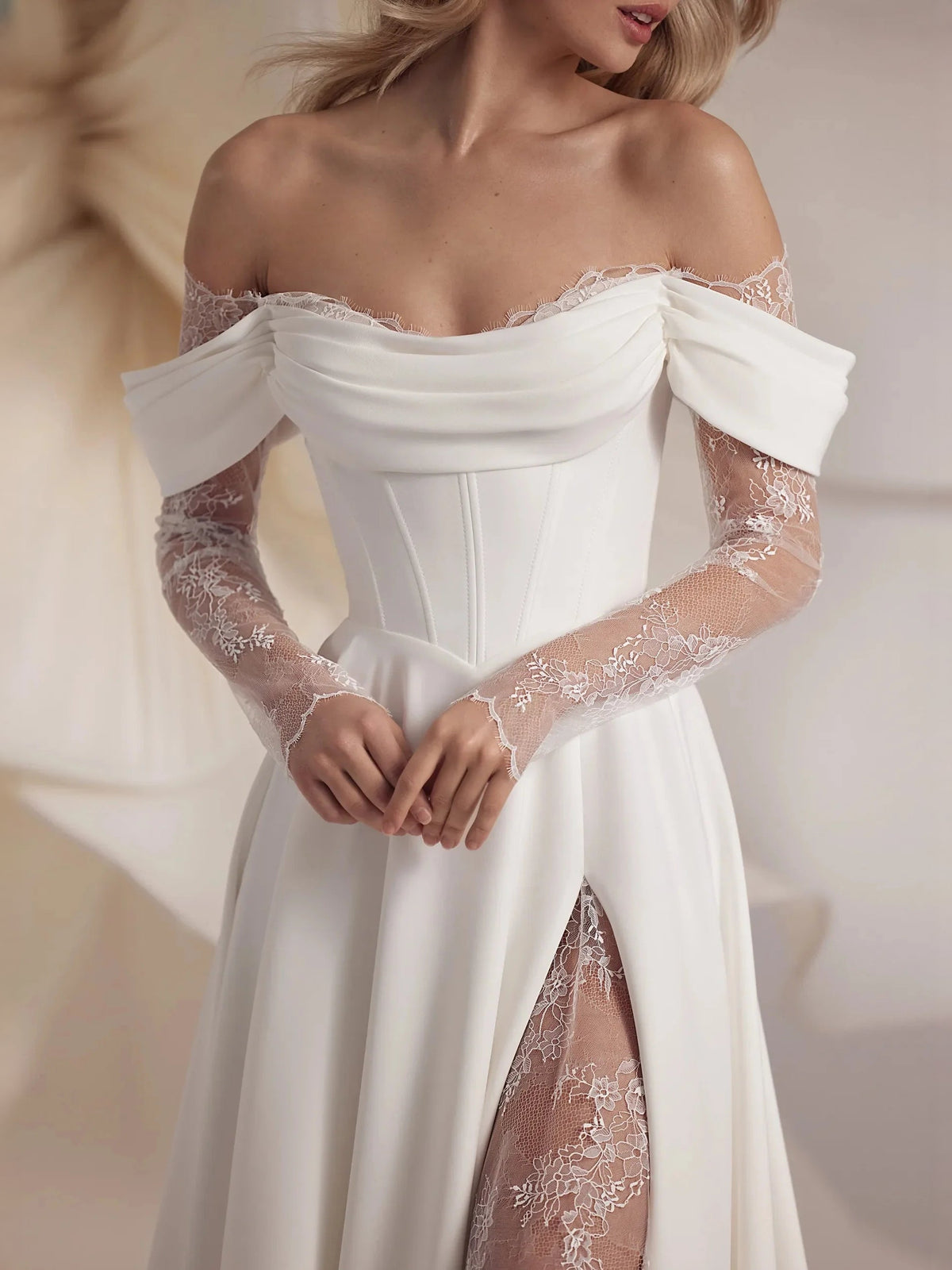 Ivory off-shoulder satin wedding corset bodice with lace sleeves and fitted waist