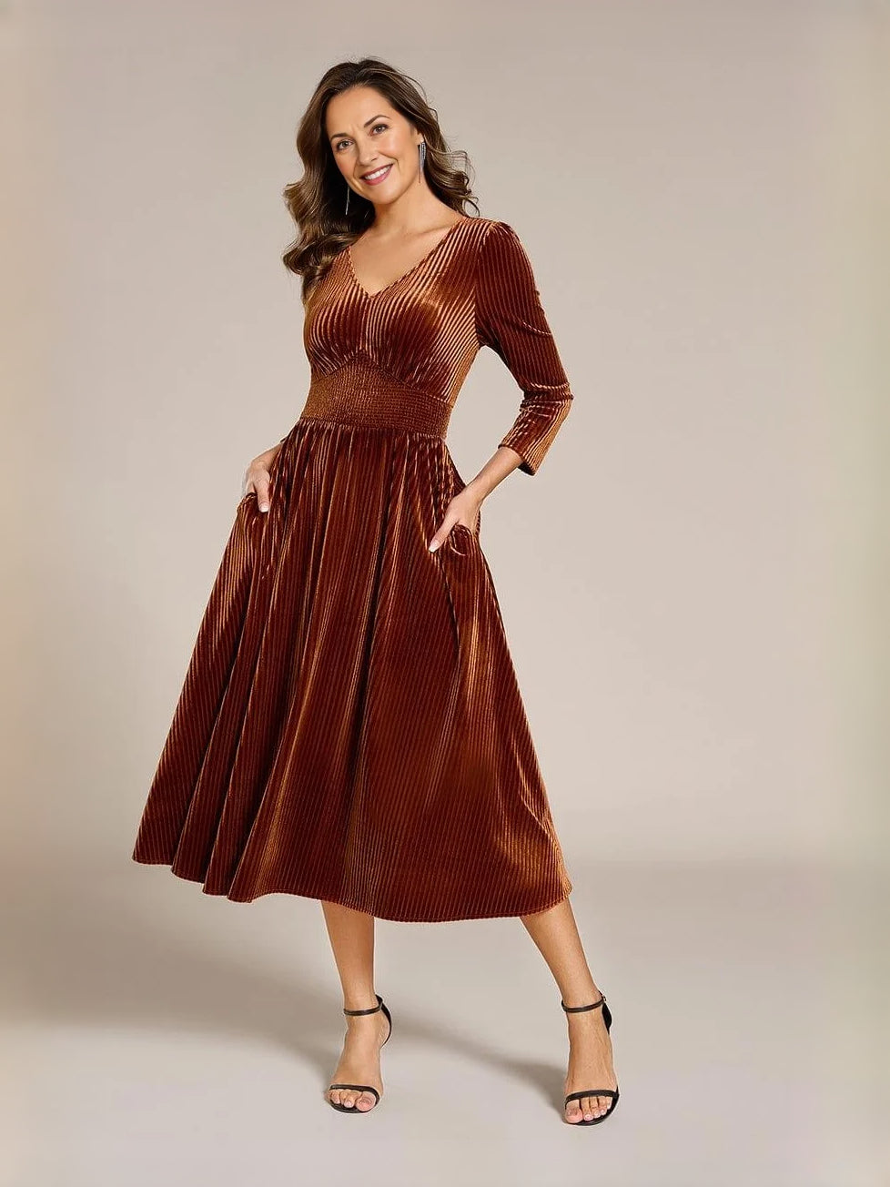 Burgundy velvet V-neck A-line midi dress with long sleeves and pleated skirt