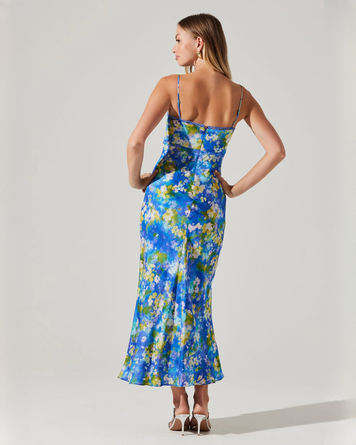Light blue floral satin maxi dress side view with spaghetti straps