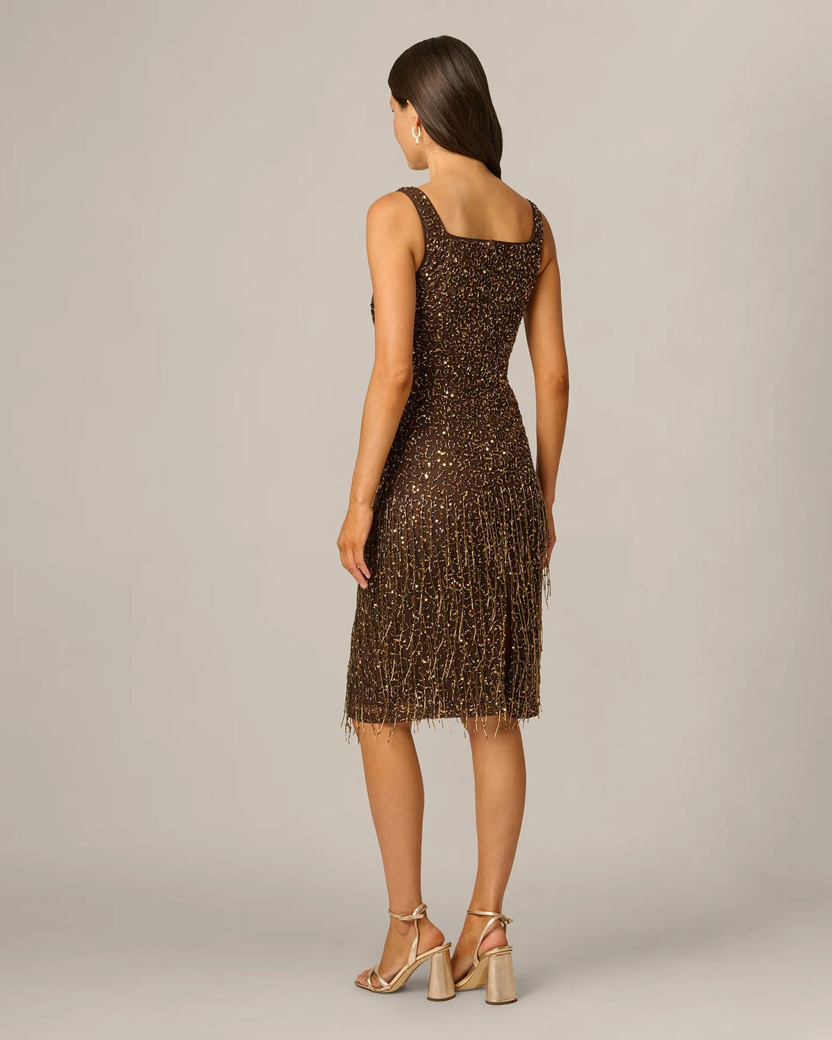 Chocolate sleeveless square-neck A-line midi dress, back view with fringe hem