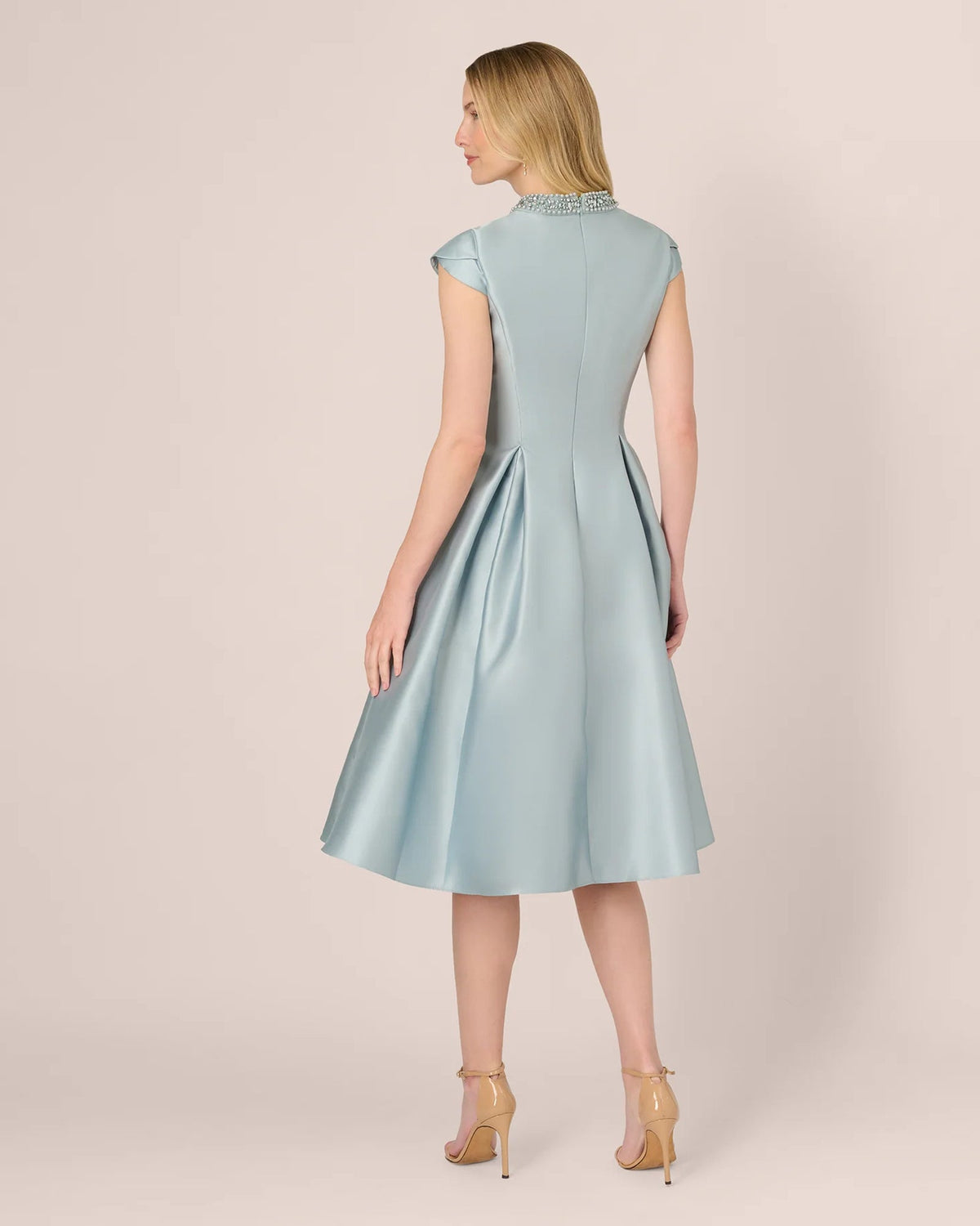 Pale blue cap-sleeve A-line midi dress, back view with center seam