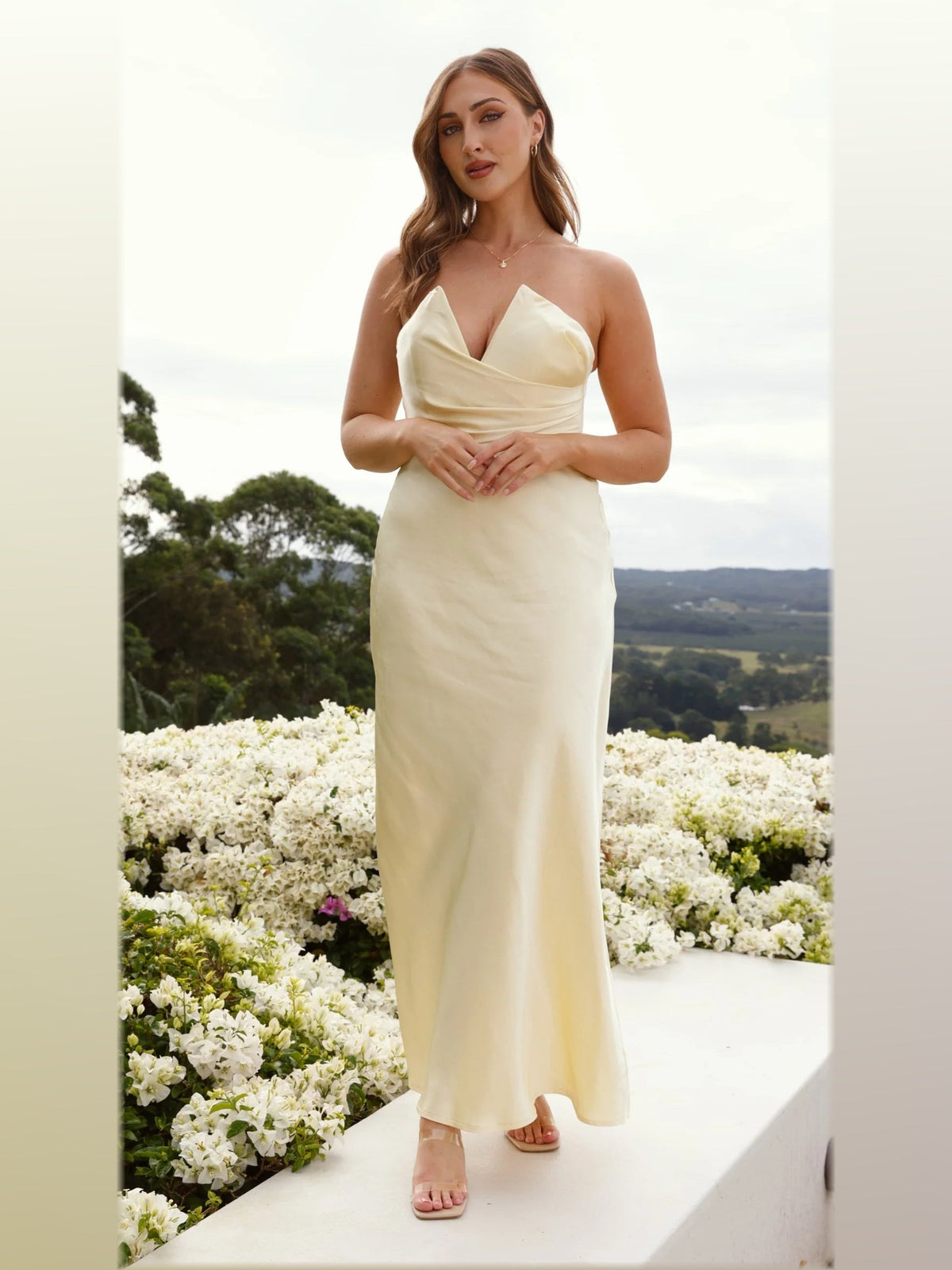Yellow midi formal dress, alternate full-length view showing the hem