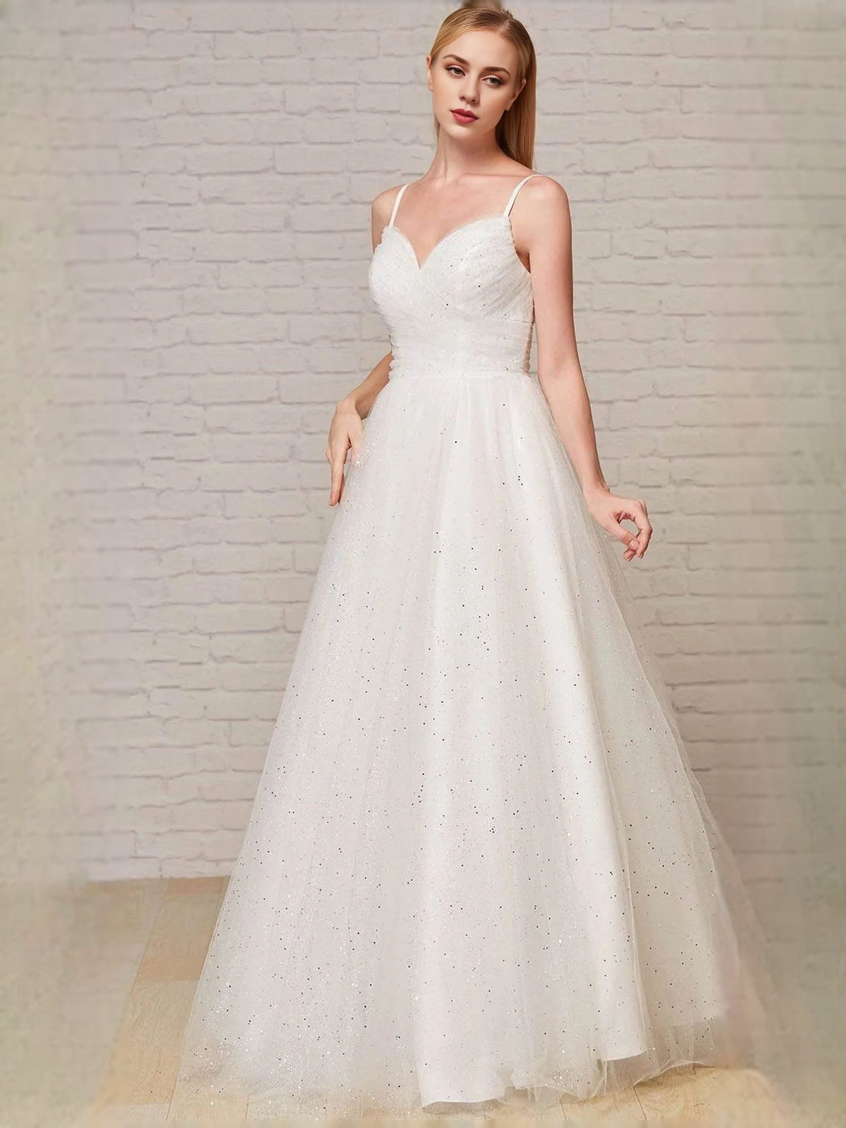 White glitter prom dress with sweetheart neckline, ruched bodice, A-line tulle skirt