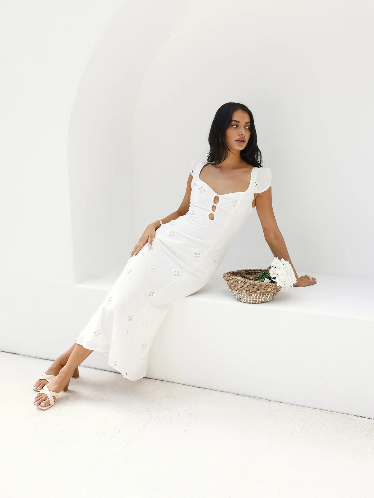 White midi dress with square neckline, embroidered eyelet motifs, front keyhole cutout