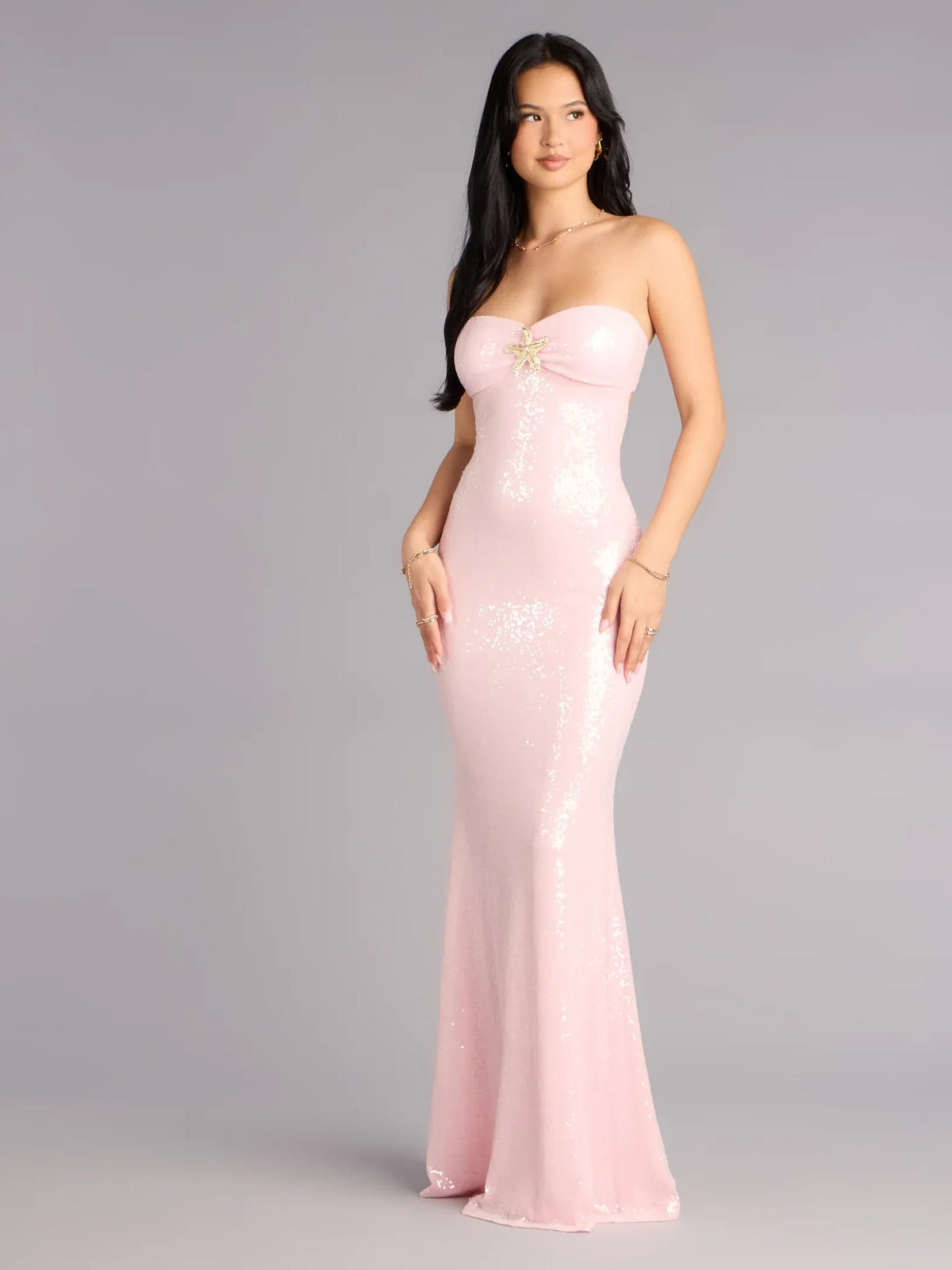 Pink sequined mermaid formal dress with strapless sweetheart neckline and starfish bow