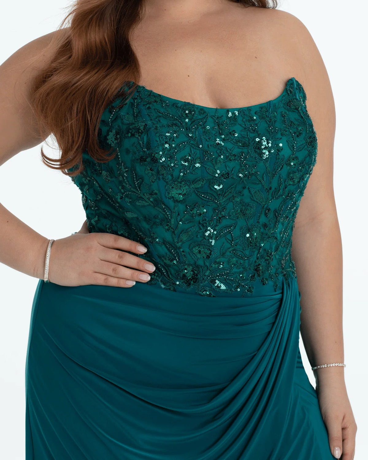 Teal-green strapless beaded corset bodice with draped waist detail