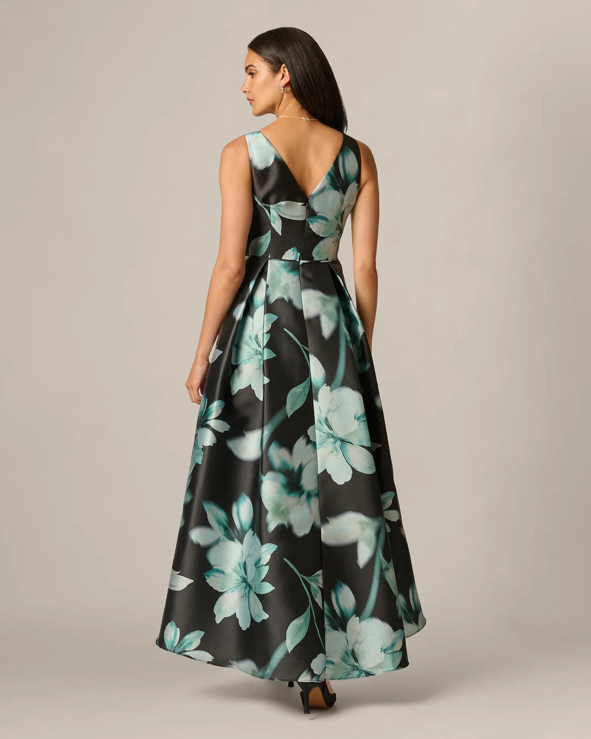Floral print maxi dress back view with spaghetti straps and high-low A-line hem