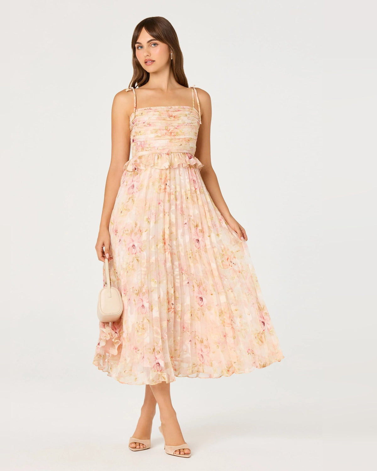 Pink floral midi A-line dress with spaghetti straps and pleated skirt