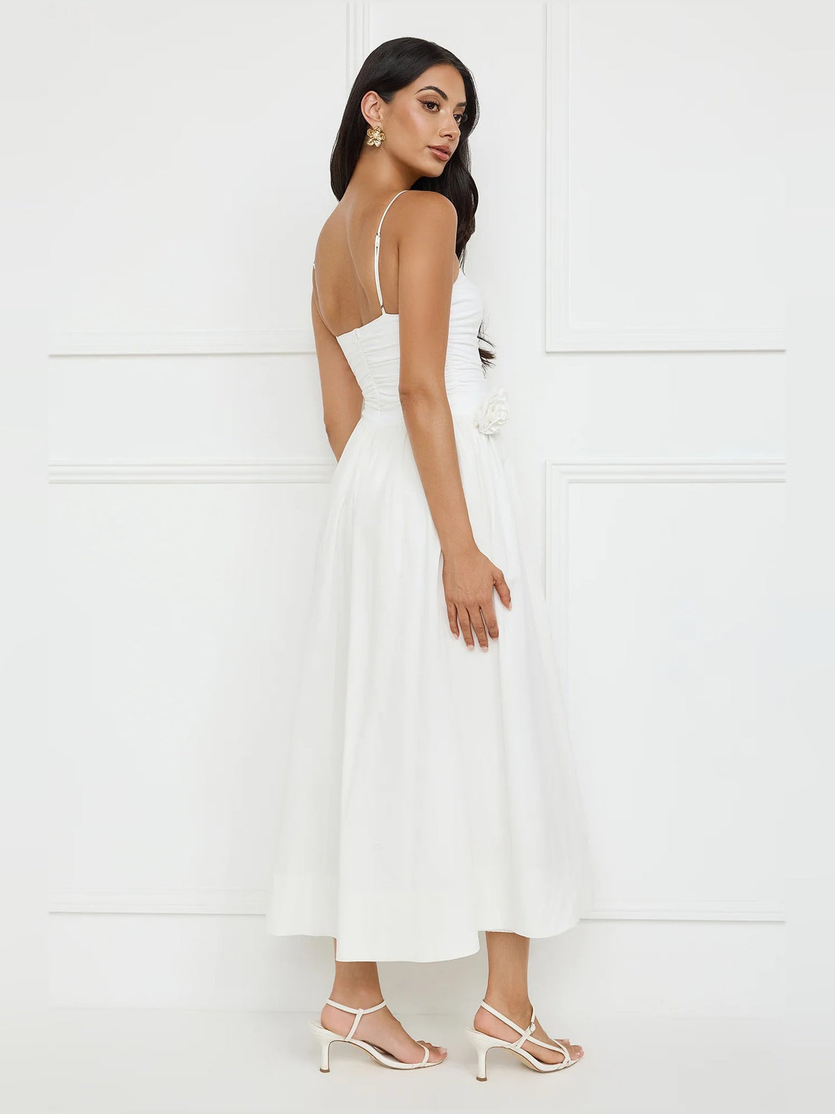White a-line maxi formal dress with floral appliqué, alternate view showing the skirt