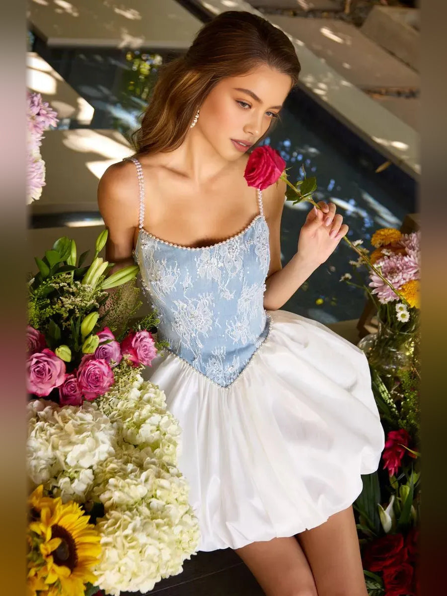 Light blue corset mini dress with beaded straps, sweetheart neckline, and white puff skirt