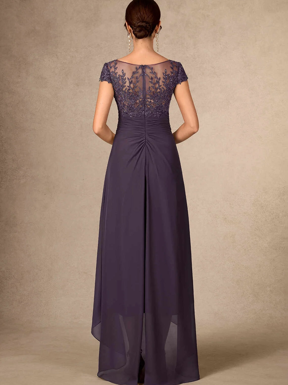 Back view of deep purple ruched V-neck chiffon mother-of-the-bride dress with floral sequin bodice