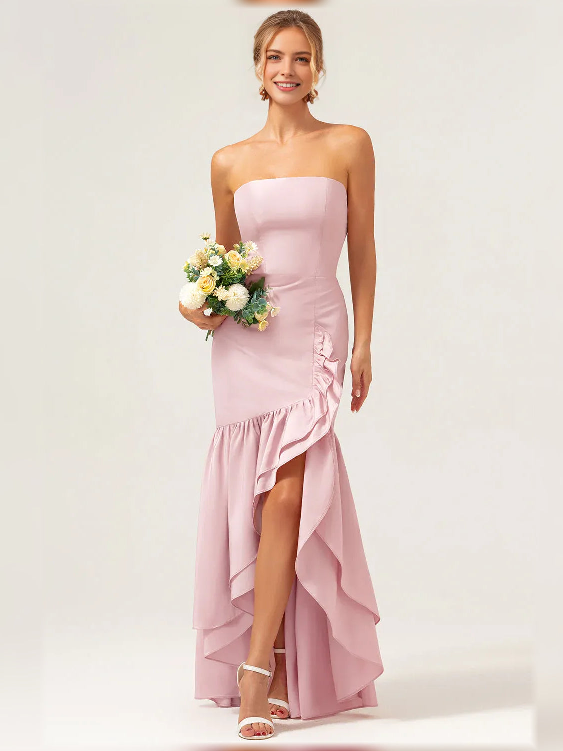 Light pink strapless tiered ruffle formal dress, fitted waist and flowing skirt