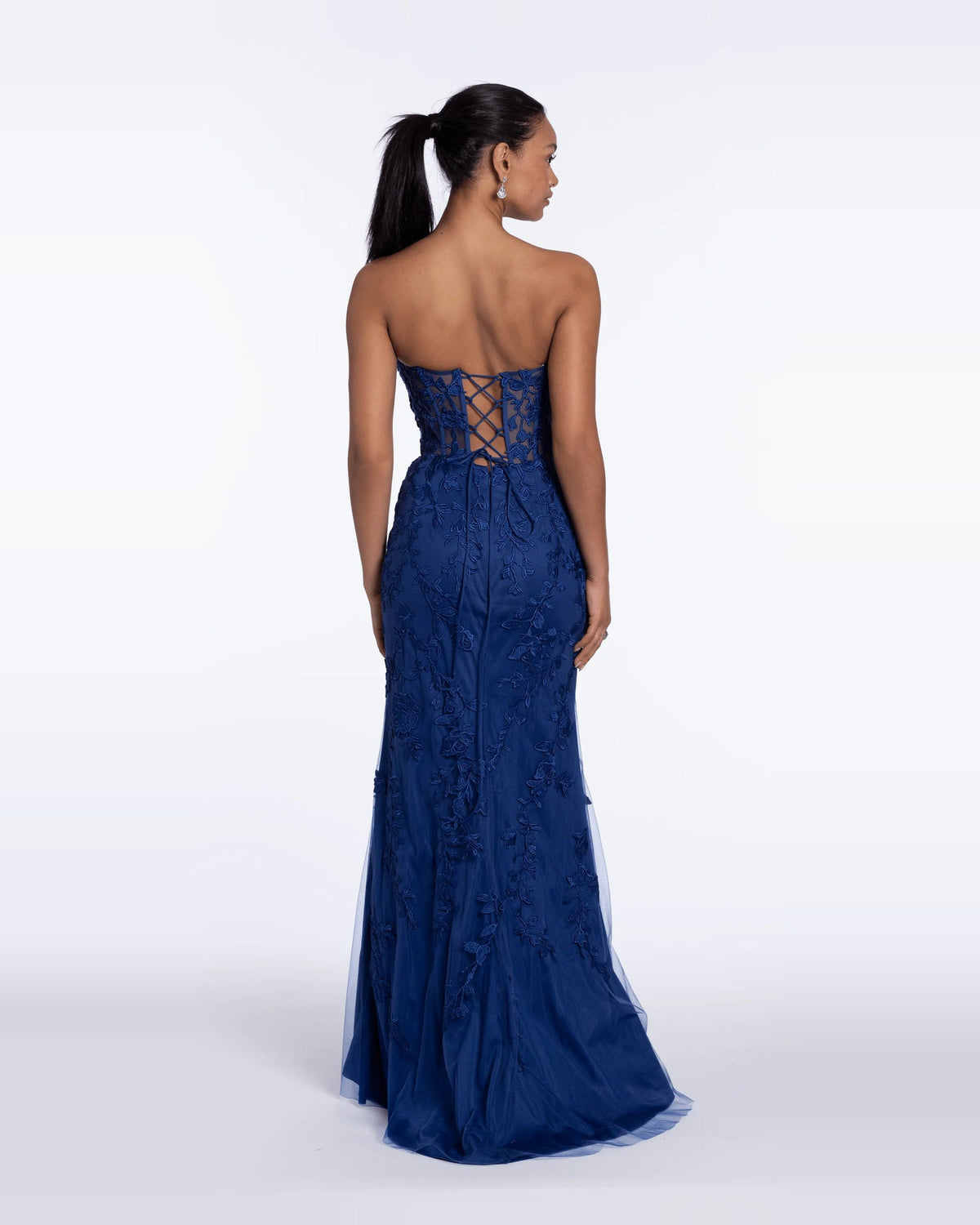 Navy corset maxi prom dress with crisscross lace-up back and embroidered full-length skirt.