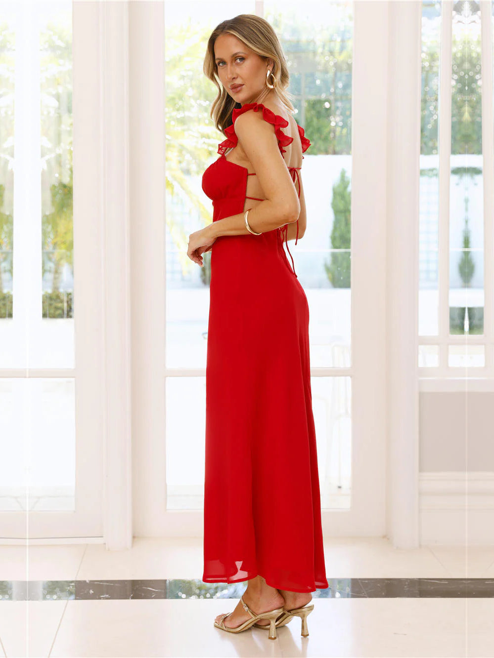 Red a-line maxi formal dress with ruffle details, alternate view showing the skirt