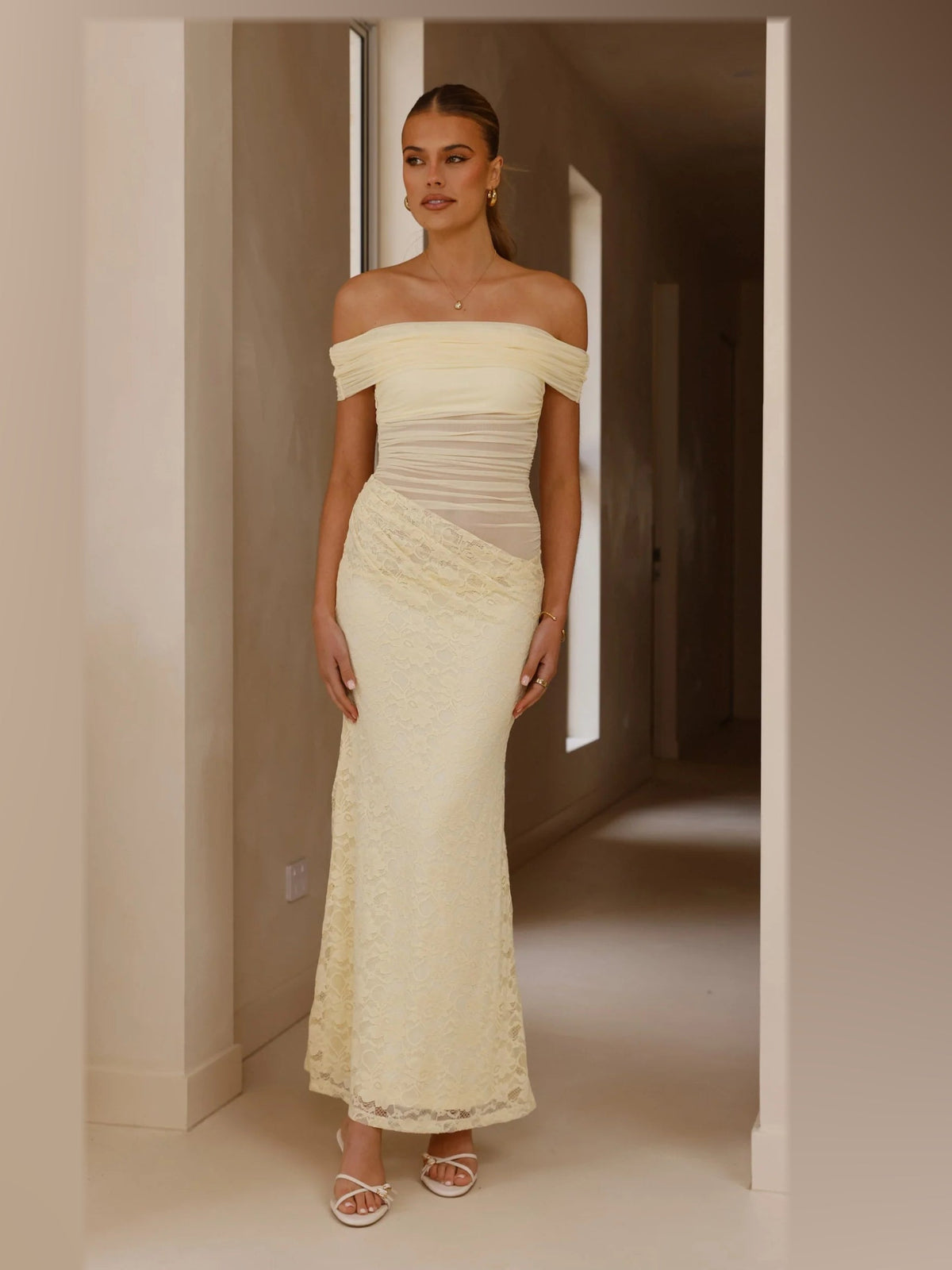 Yellow maxi formal dress, alternate full-length view showing the hem