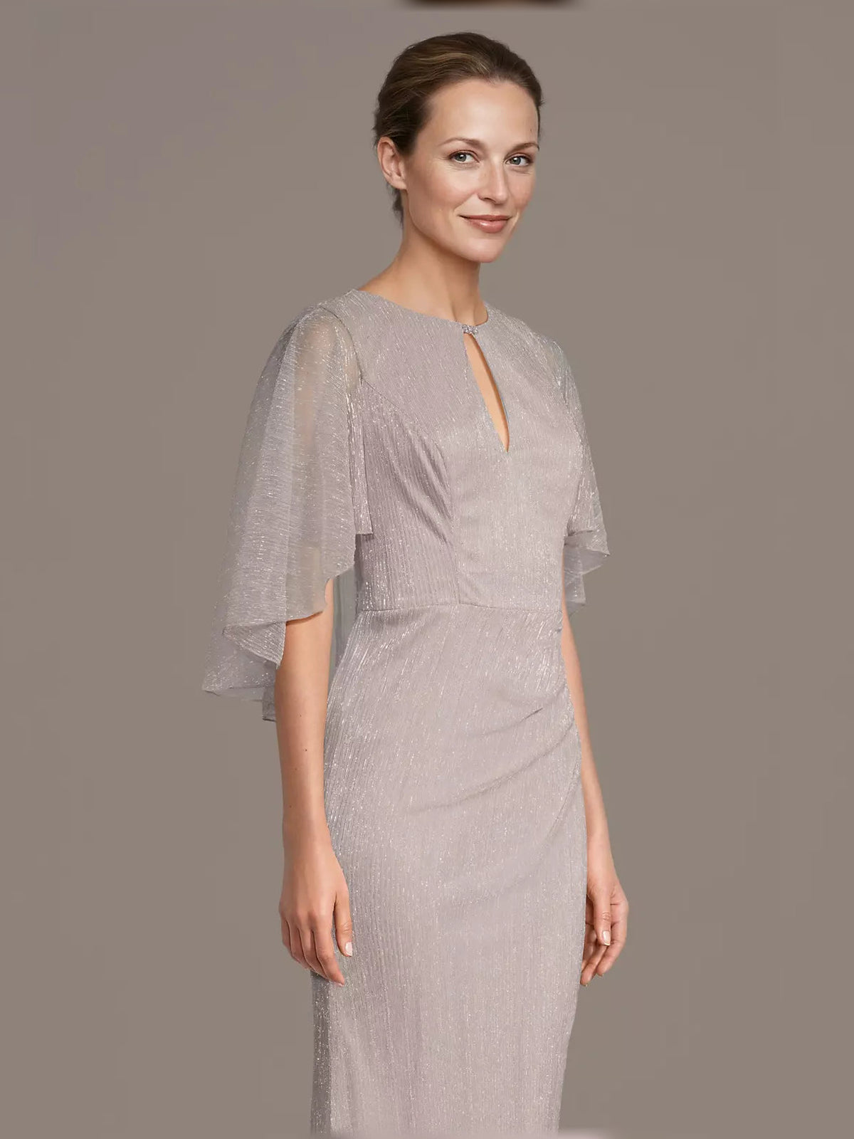 Blush pink maxi dress with ruched waist, keyhole neckline, and sheer flutter sleeves