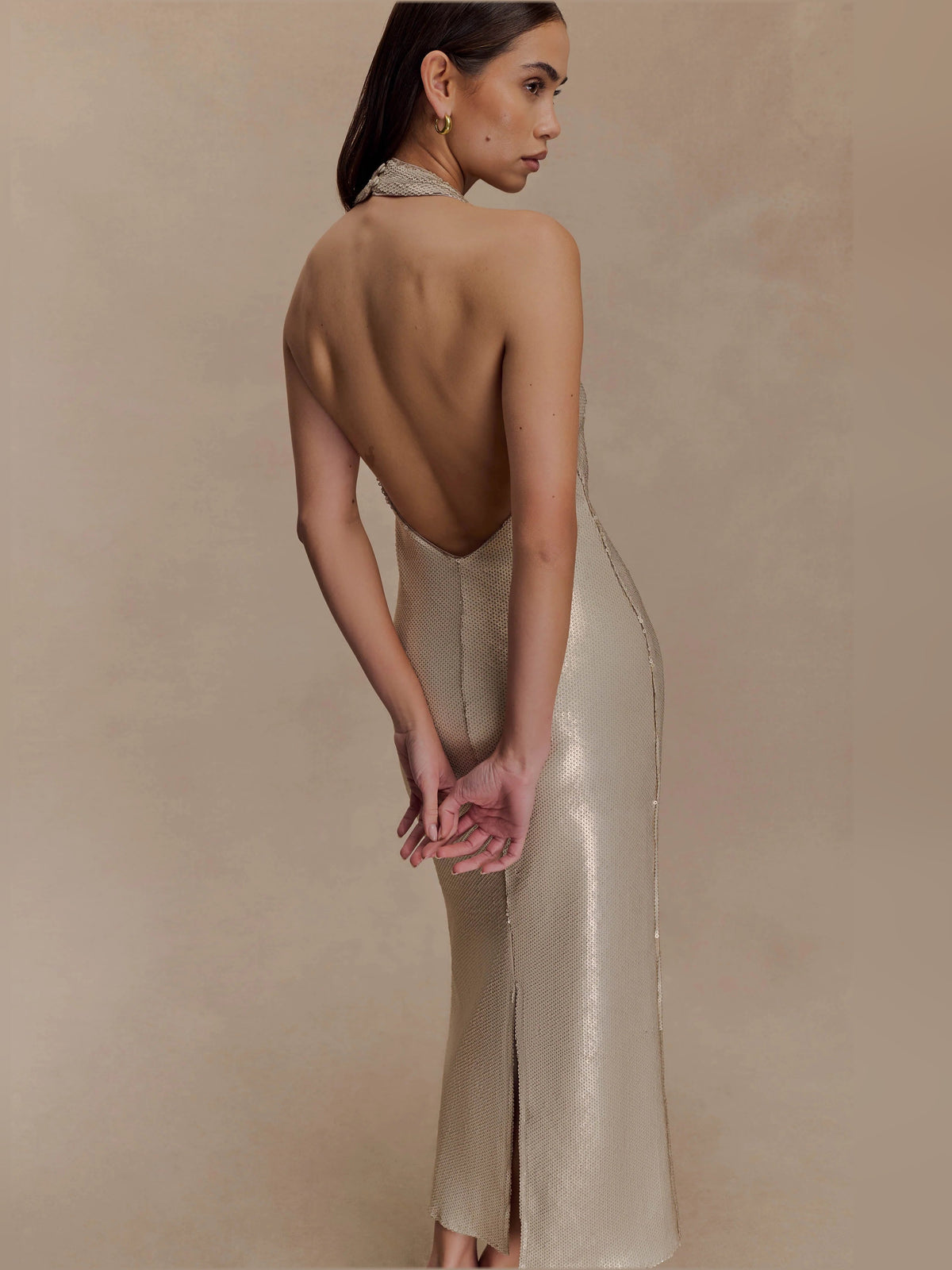 Gold sequin halter midi formal dress with open back and center back slit