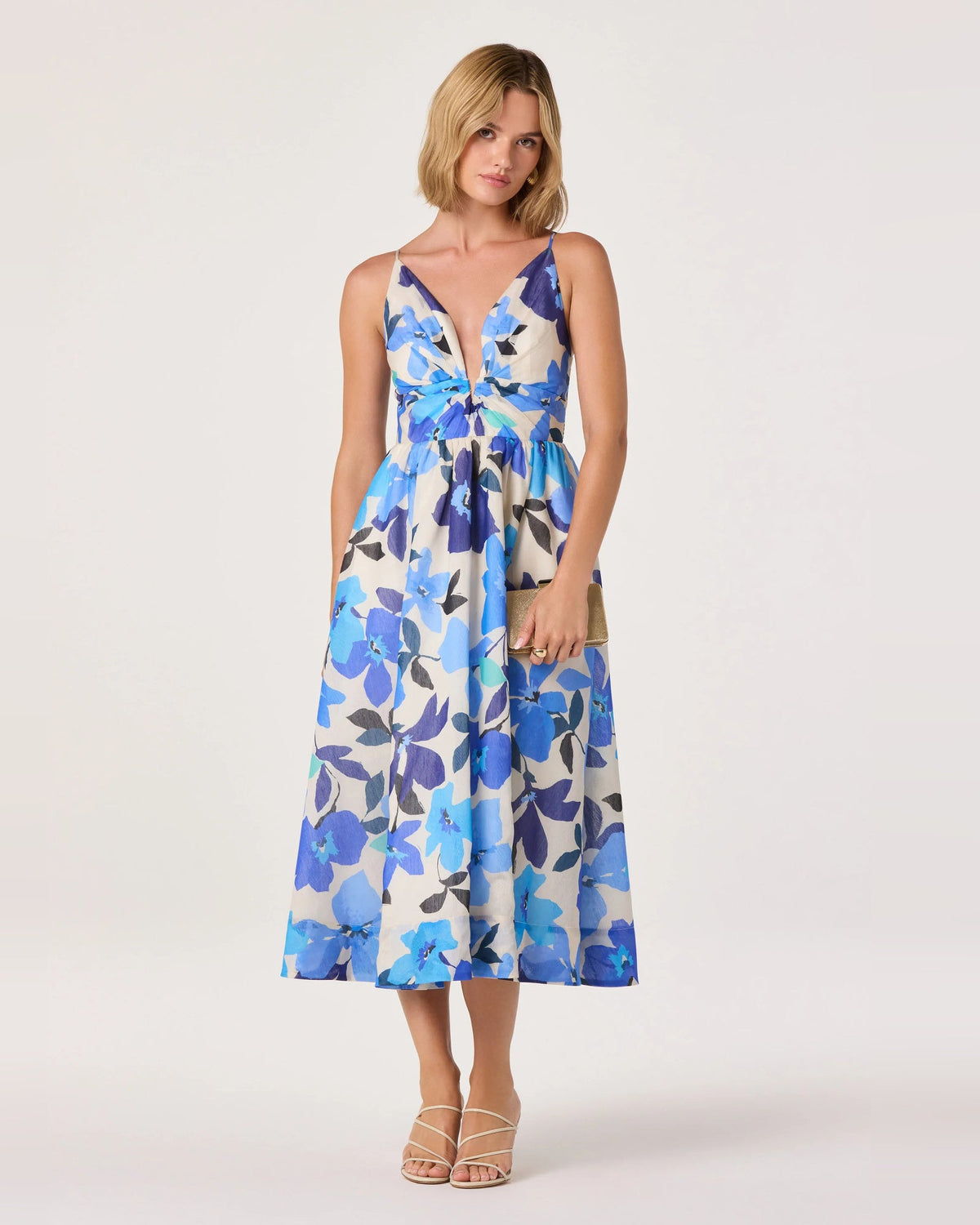 Front view of blue floral spaghetti-strap A-line midi dress with V-neck and gathered waist