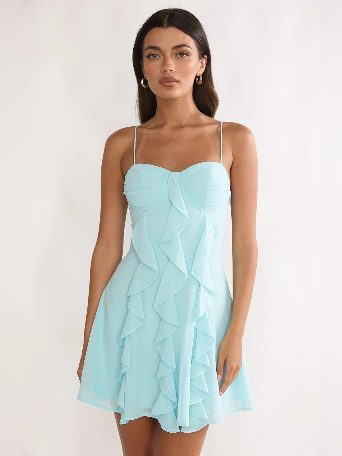 Aqua ruffled mini dress with sweetheart neckline, spaghetti straps, tiered ruffle skirt