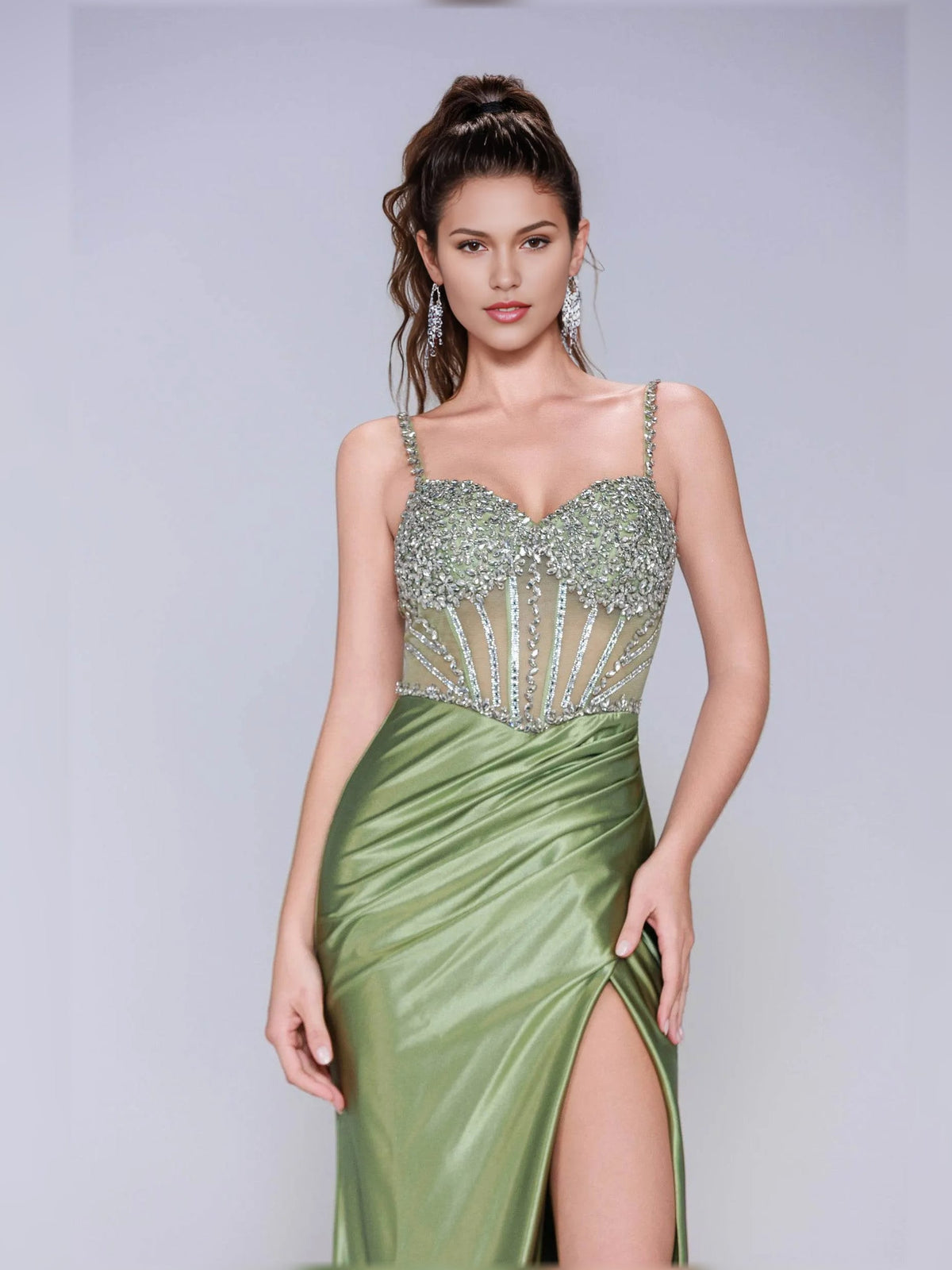Dusty sage corset formal dress with beaded sweetheart bodice and front slit skirt.