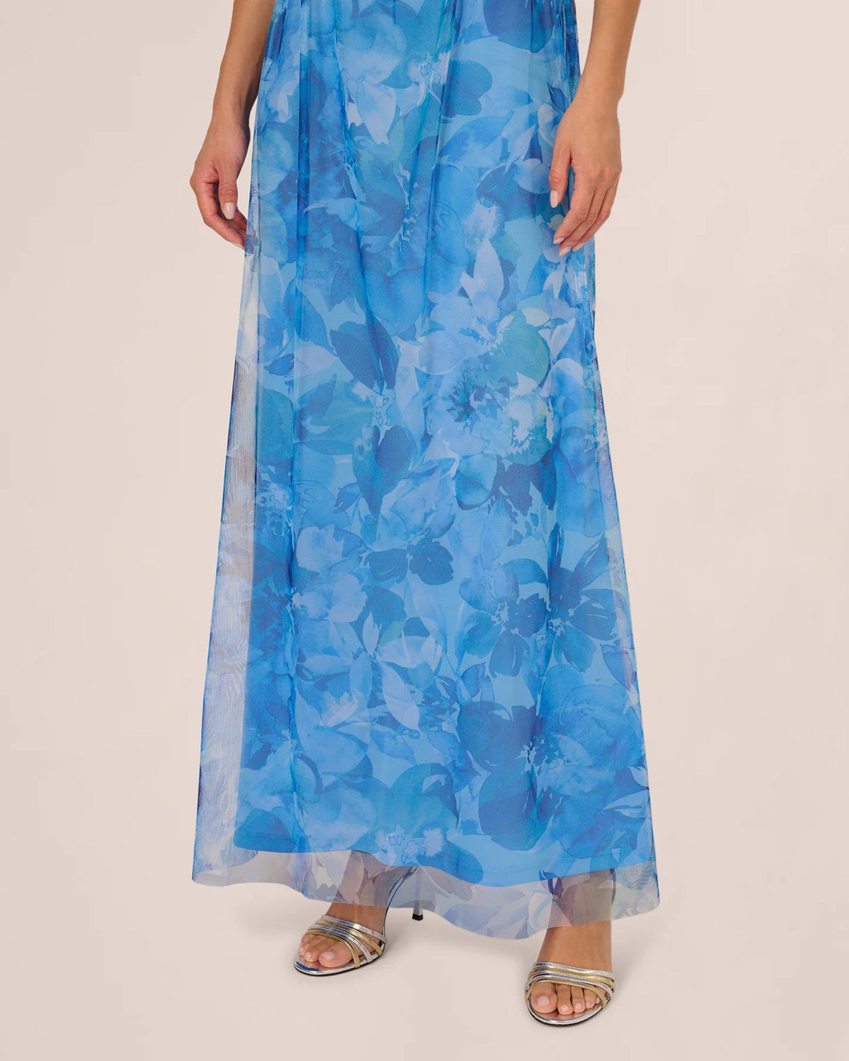 Blue floral A-line maxi skirt with flowing overlay and sheer hem panel