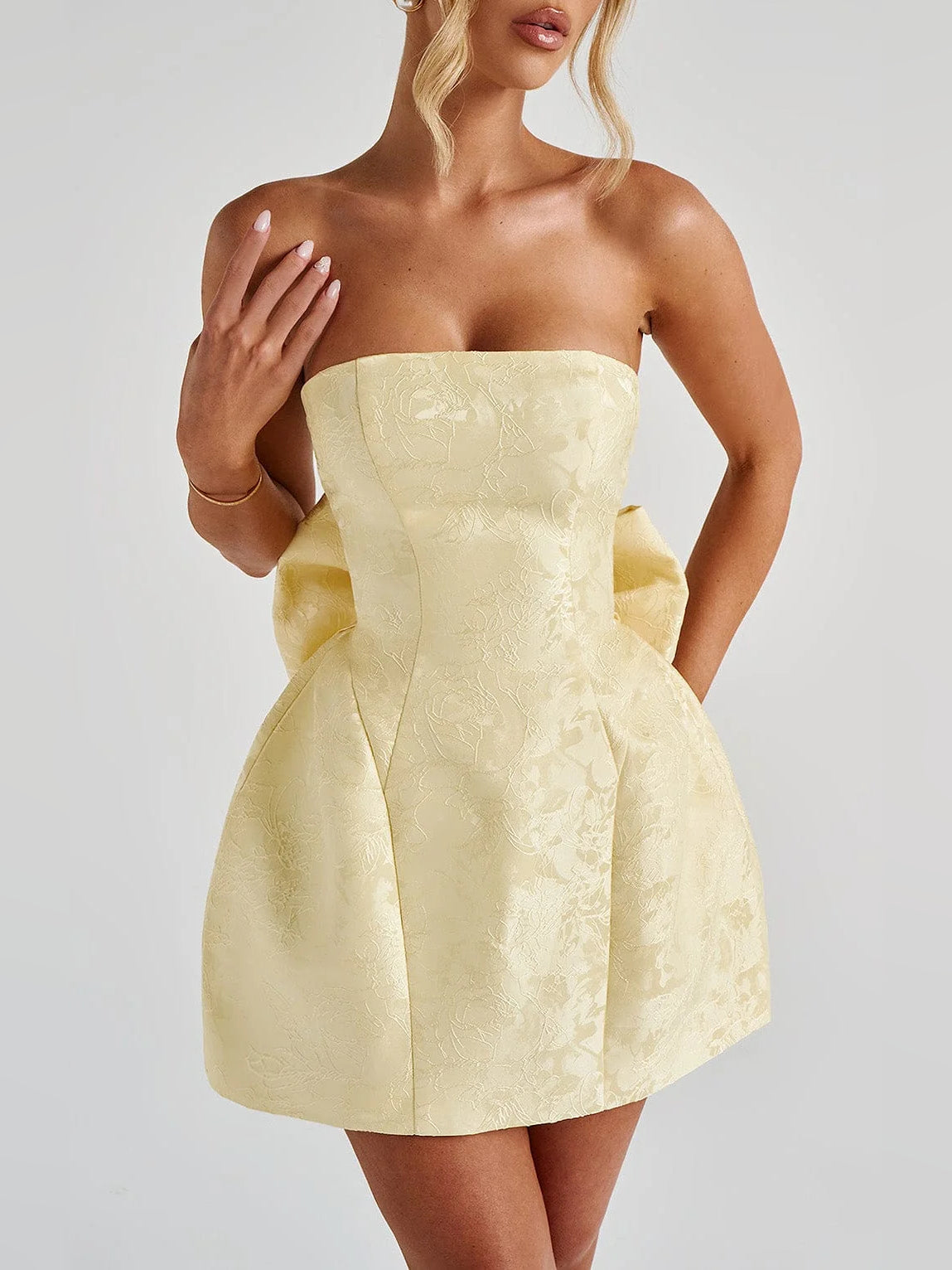 Lemon strapless mini homecoming dress with textured bodice and structured A-line skirt
