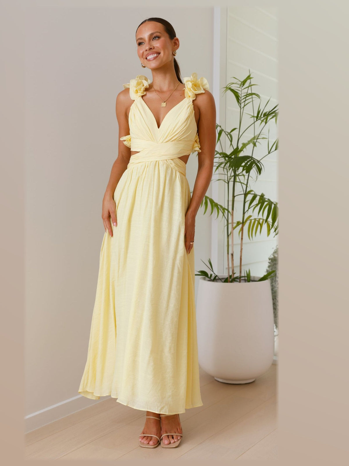 Yellow maxi formal dress, alternate full-length view showing the hem
