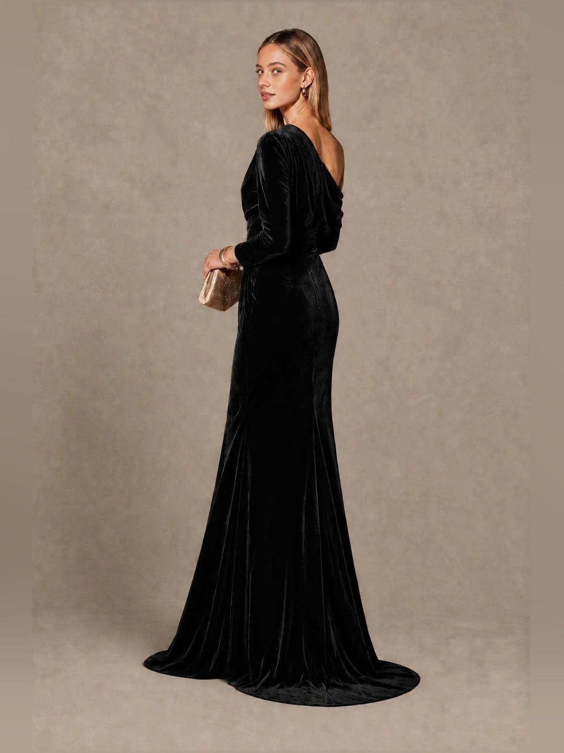 Black velvet one-shoulder mermaid gown with draped bodice and long sleeve