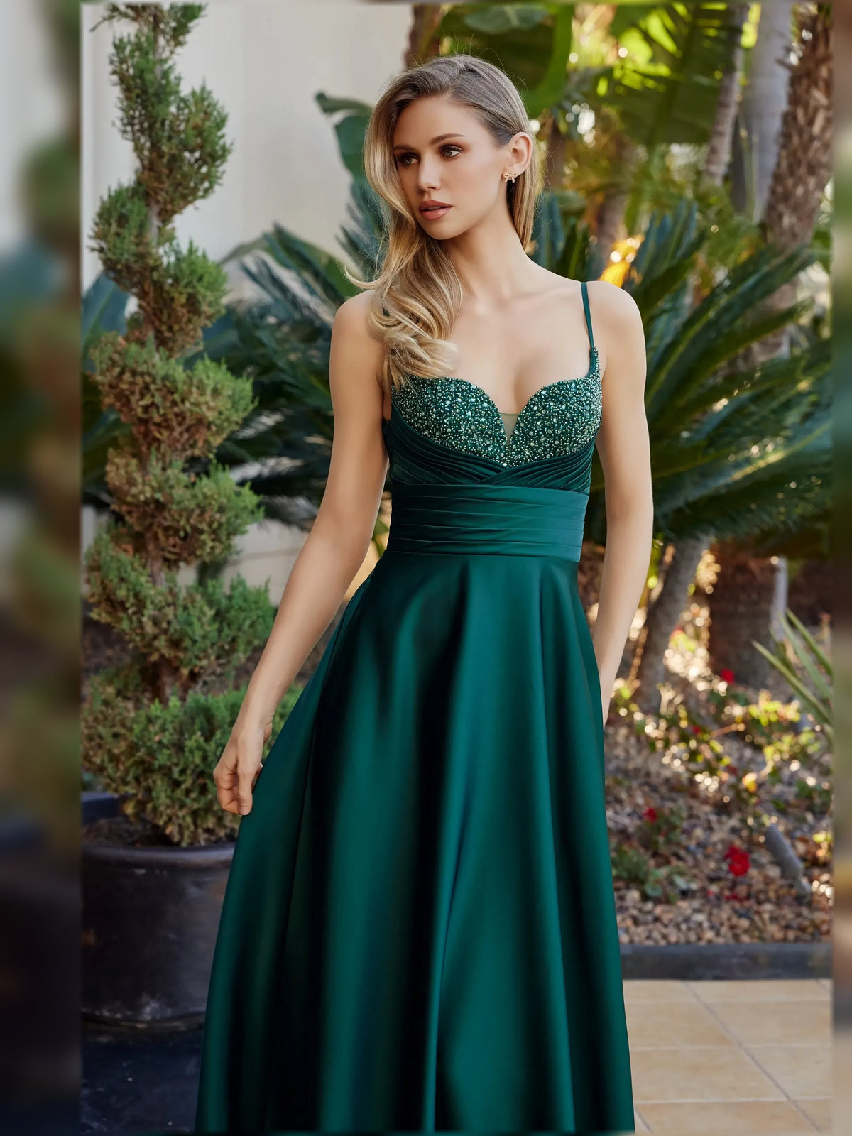 Peacock green sweetheart A-line formal dress with beaded bodice and ruched waist