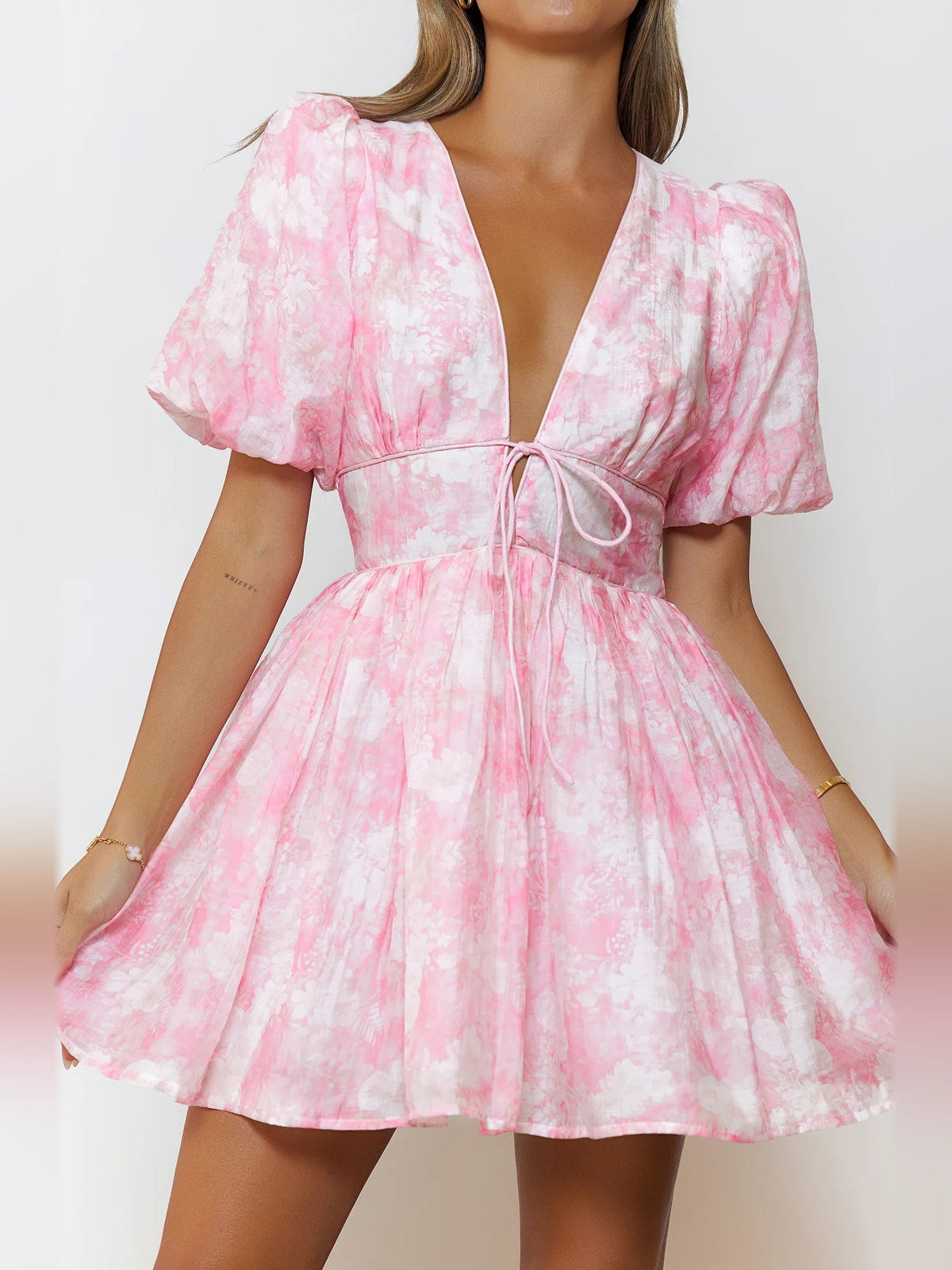 Pink printed mini dress bodice with V-neck and tied waist