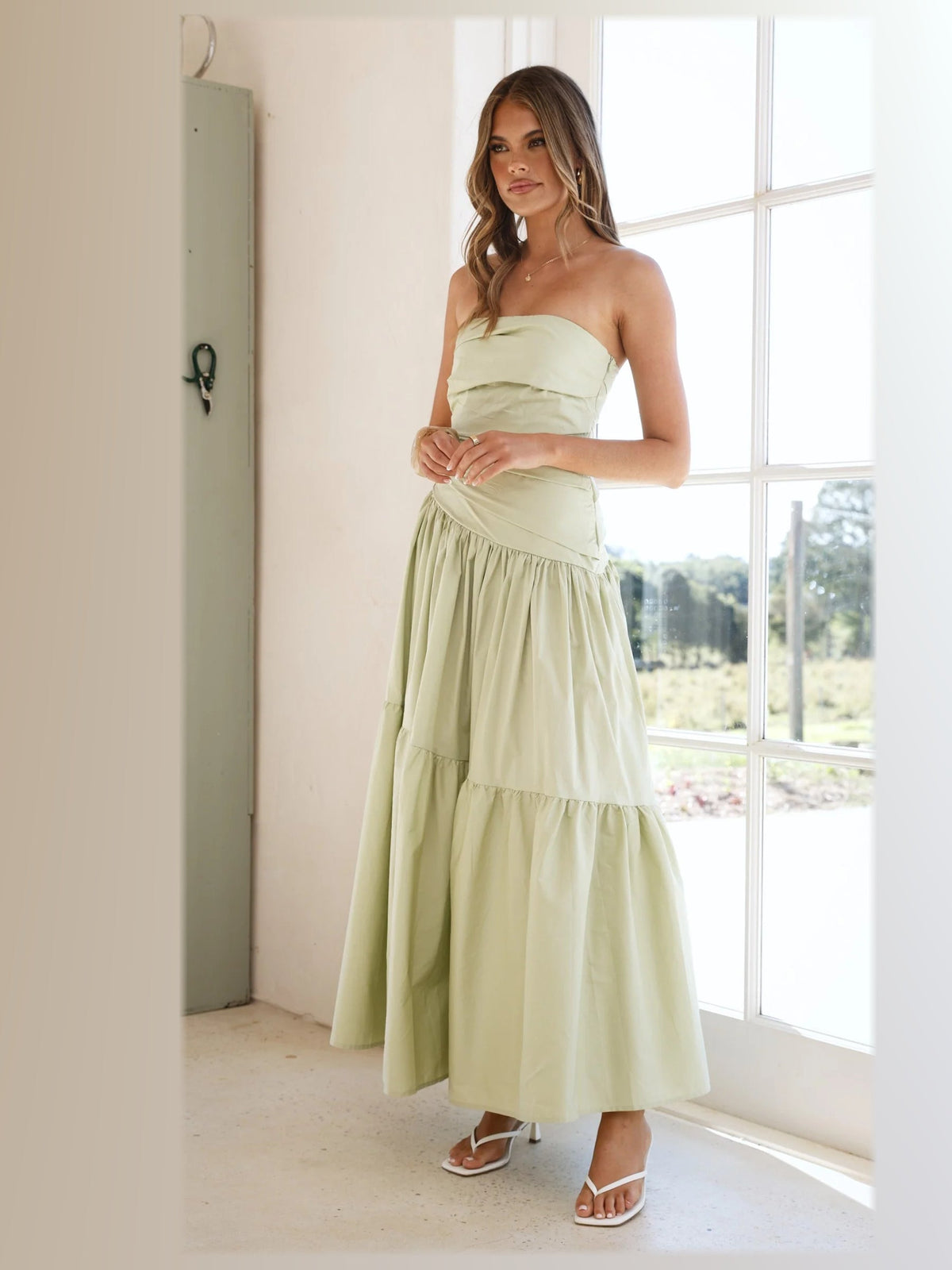 Sage midi formal dress, alternate full-length view showing the hem