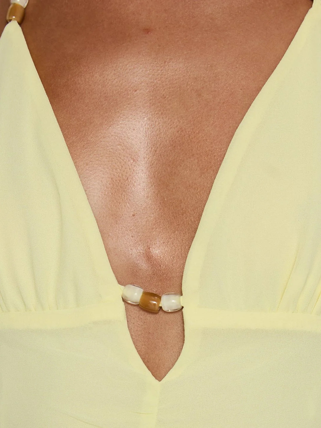 Yellow formal dress with asymmetrical shape