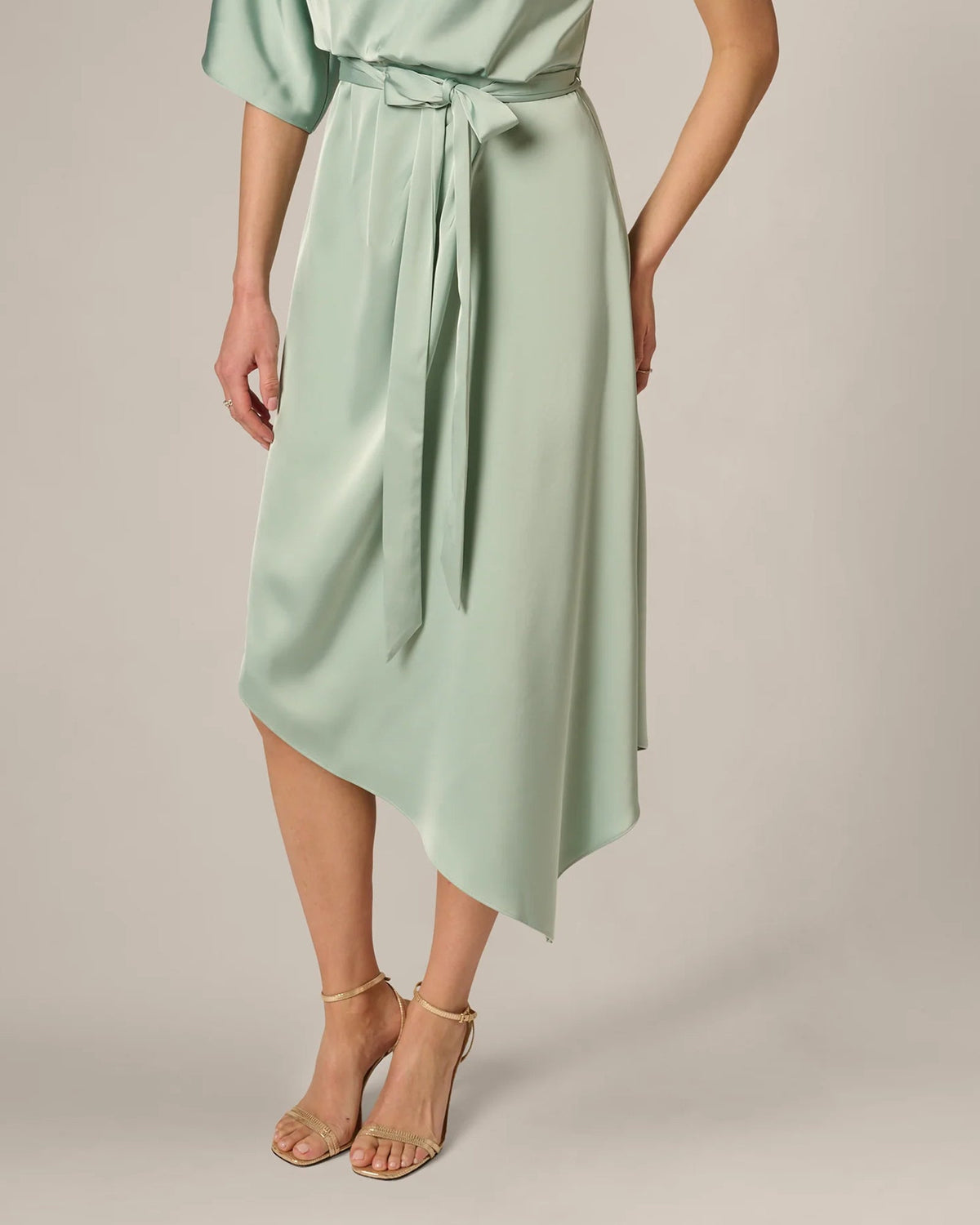Mint green midi A-line dress with tie waist and asymmetrical layered hem
