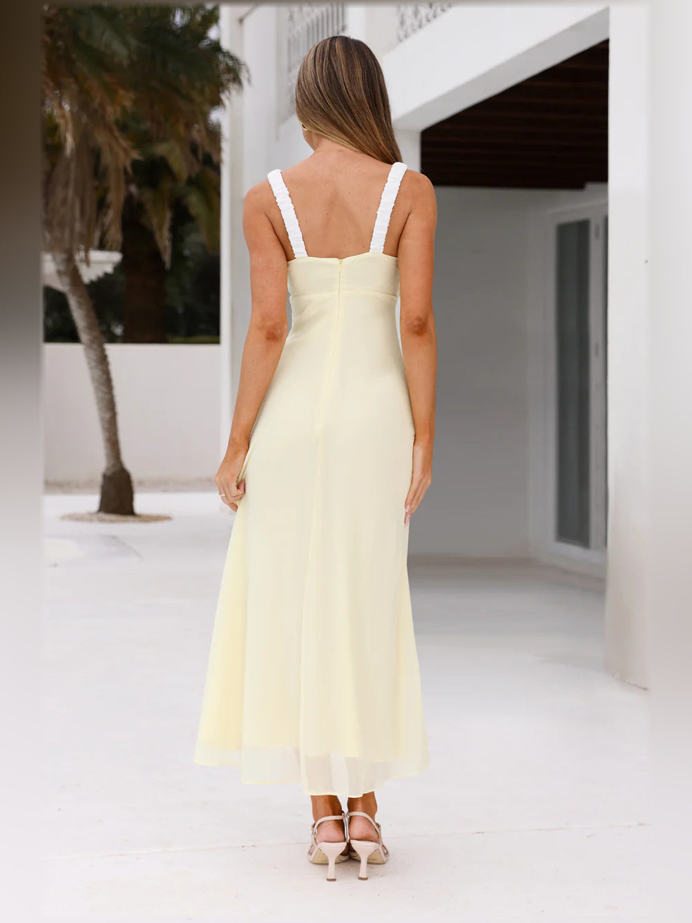 Yellow midi formal dress with open-back design and lace-trim straps