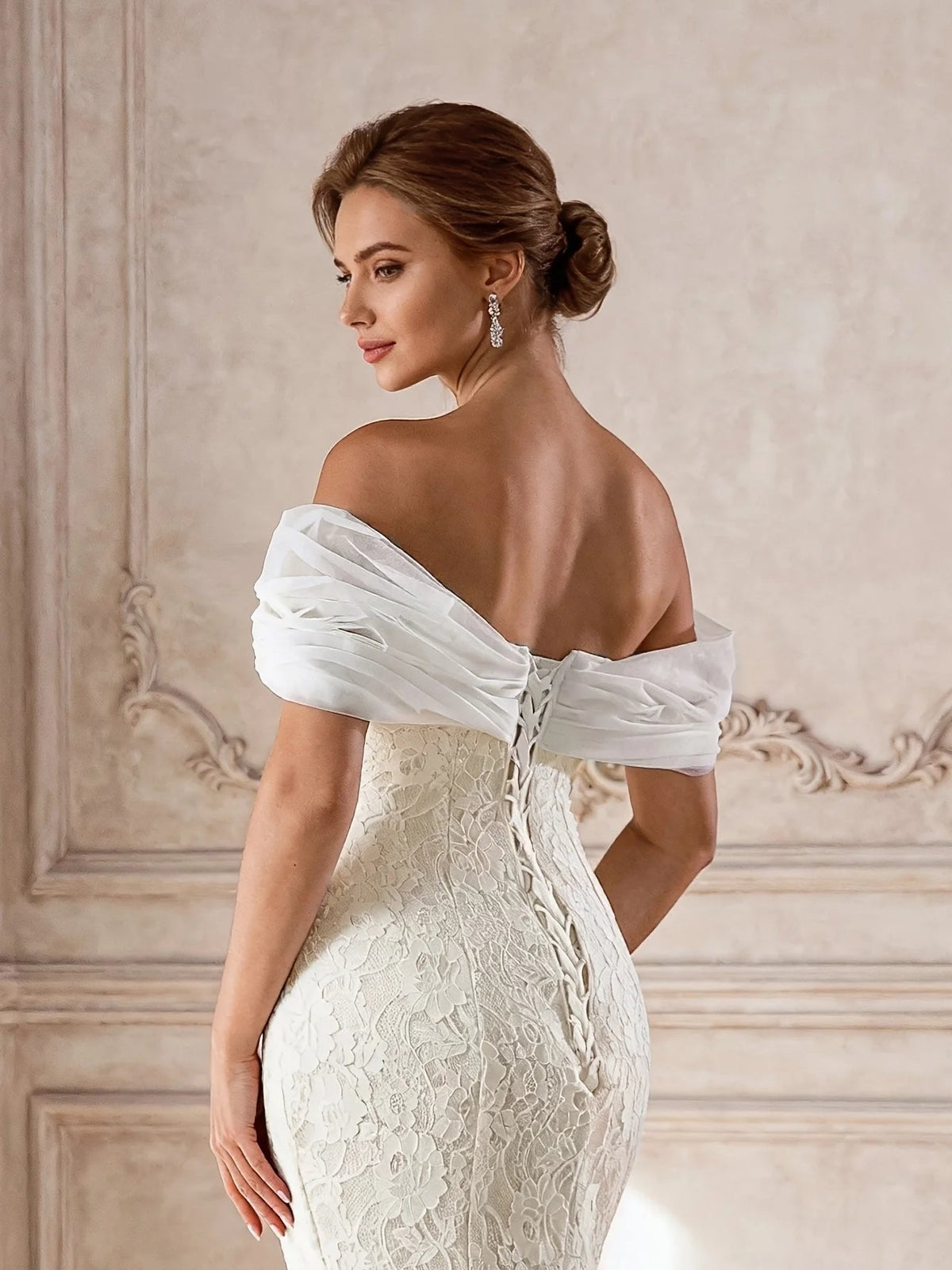 Ivory lace mermaid wedding dress with off-shoulder draped neckline and open back