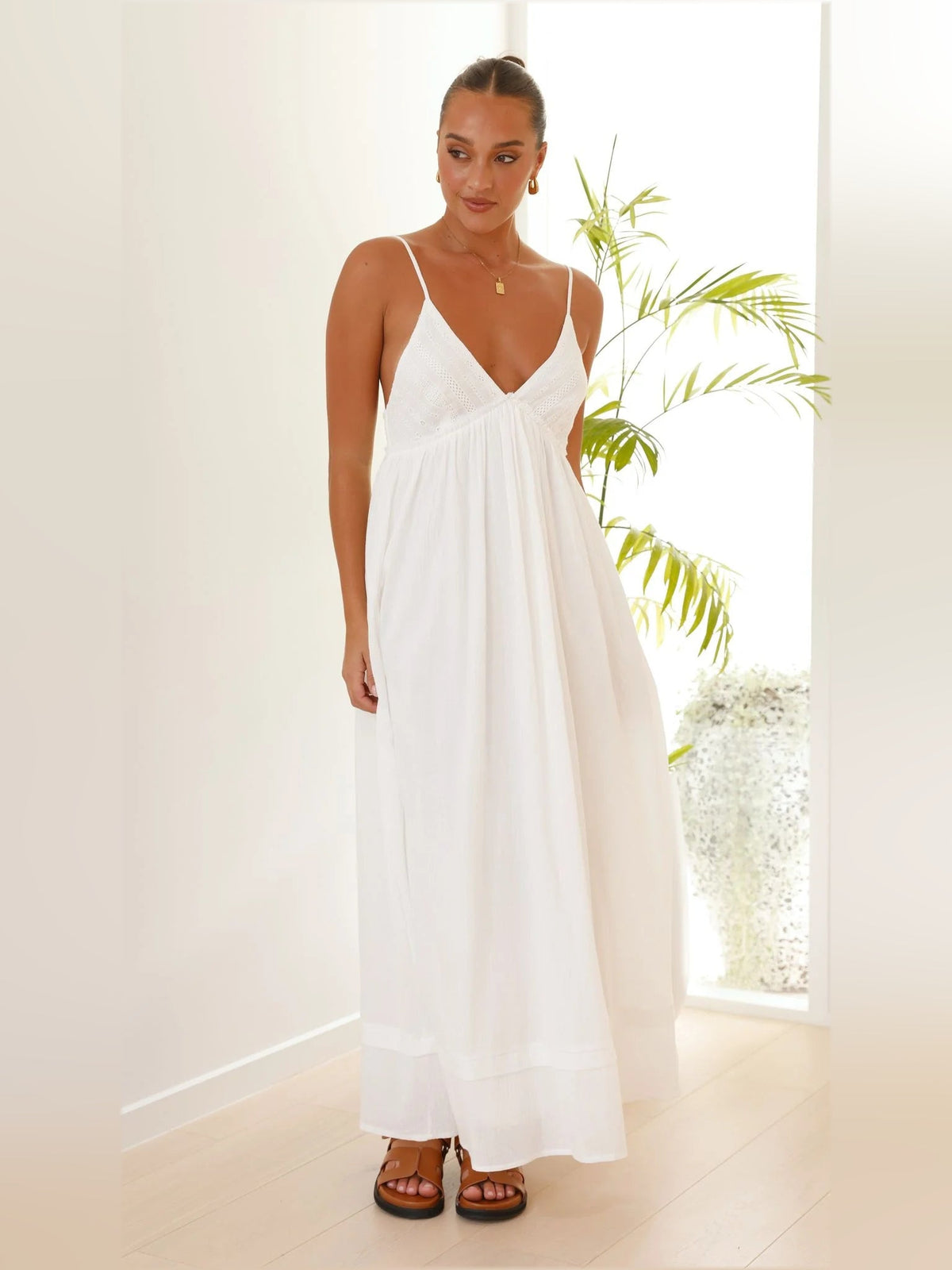 White a-line maxi formal dress with V-neckline, alternate view showing the skirt