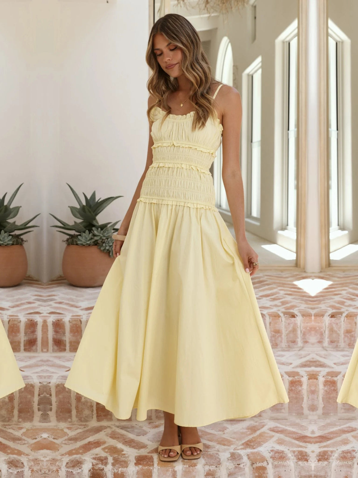 Yellow a-line maxi formal dress with a-line, alternate view showing the skirt