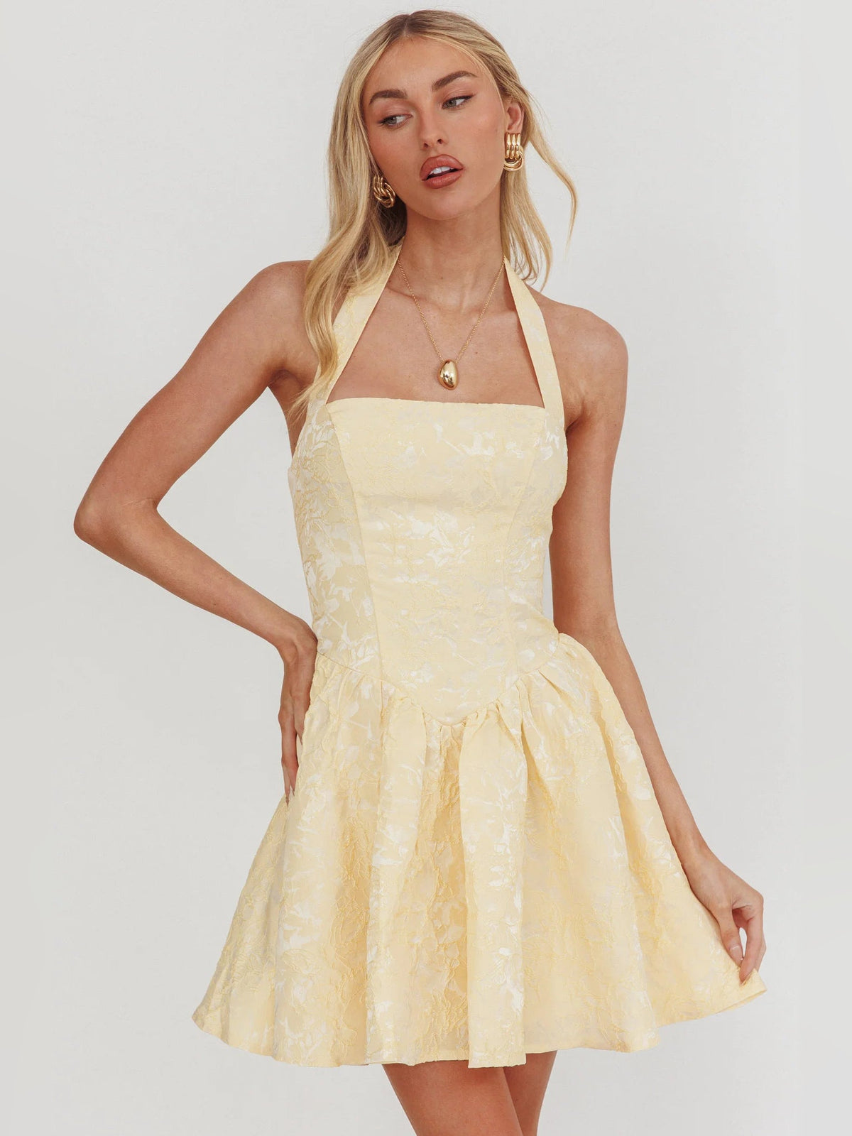 Butter halter mini homecoming dress with square neckline and flared ruffle hem