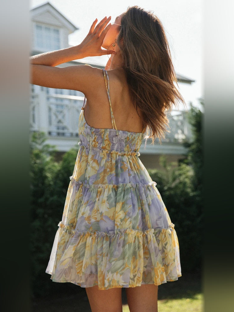 Floral tiered mini dress with open back and thin tie straps, tiered skirt