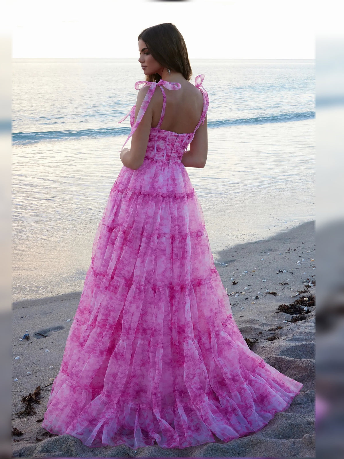 Magenta sweetheart corset tiered floor-length formal dress with bow straps