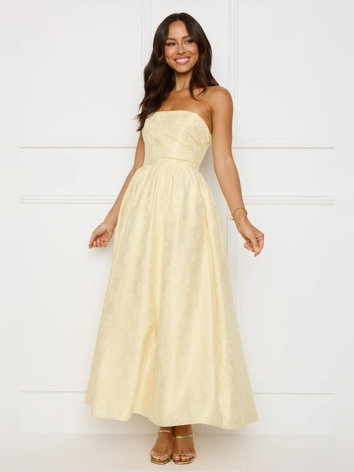 Yellow a-line maxi formal dress with strapless neckline, alternate view showing the skirt