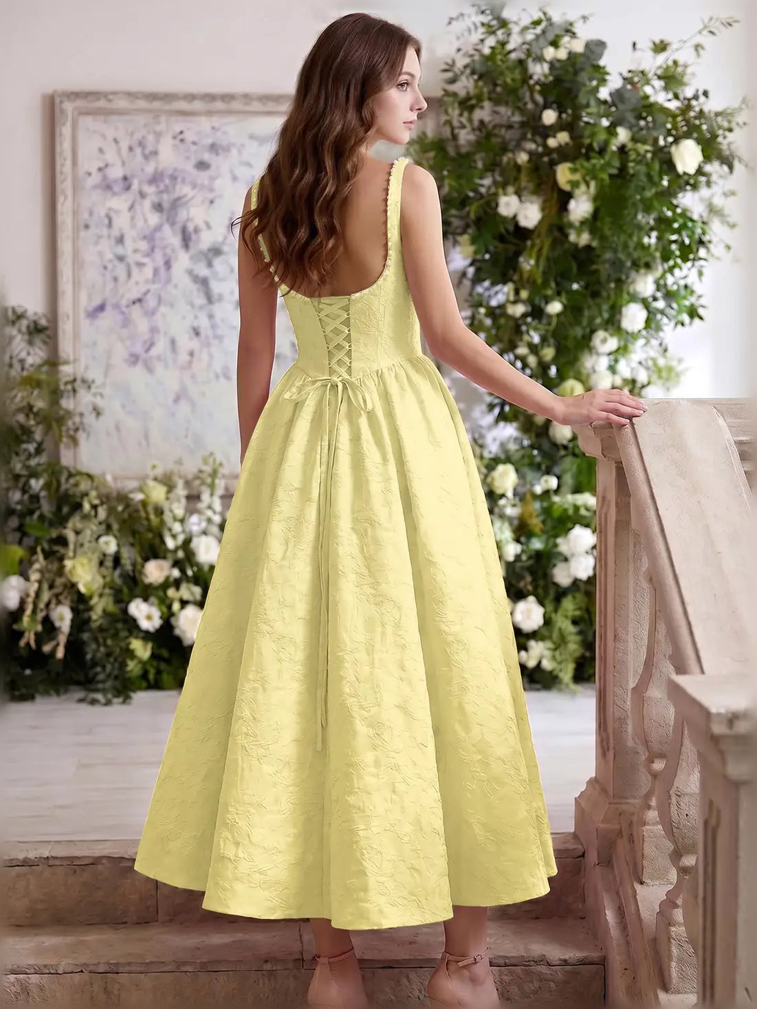 Lemon yellow corset tea-length dress, back view, sleeveless with gathered full skirt