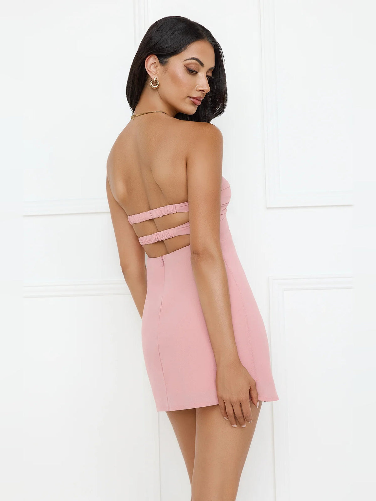 Pink back mini dress with crisscross strap cutout and open back
