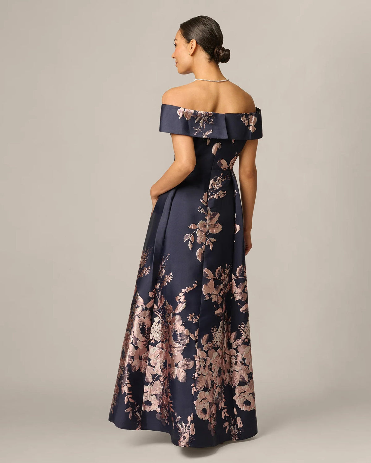 Navy off-shoulder A-line maxi dress with blush floral print, back view