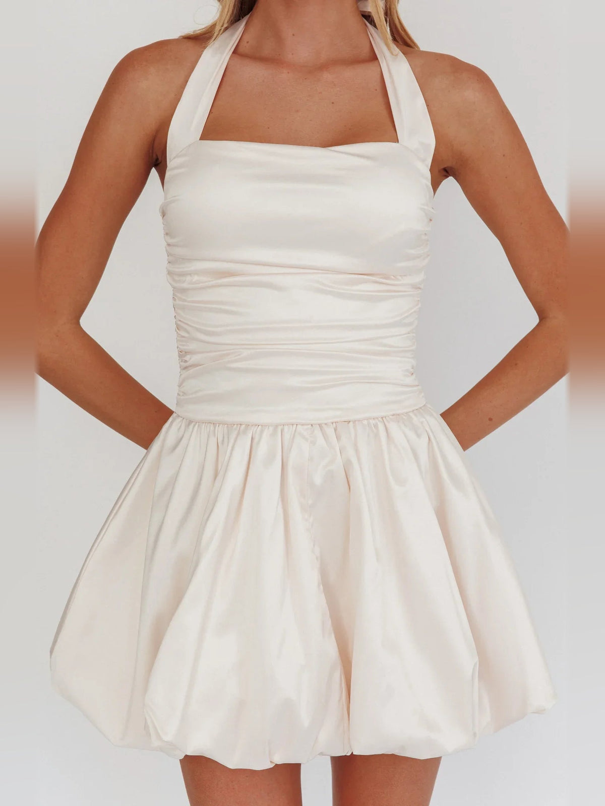 Ruched satin halter mini dress in cream with fit-and-flare skirt